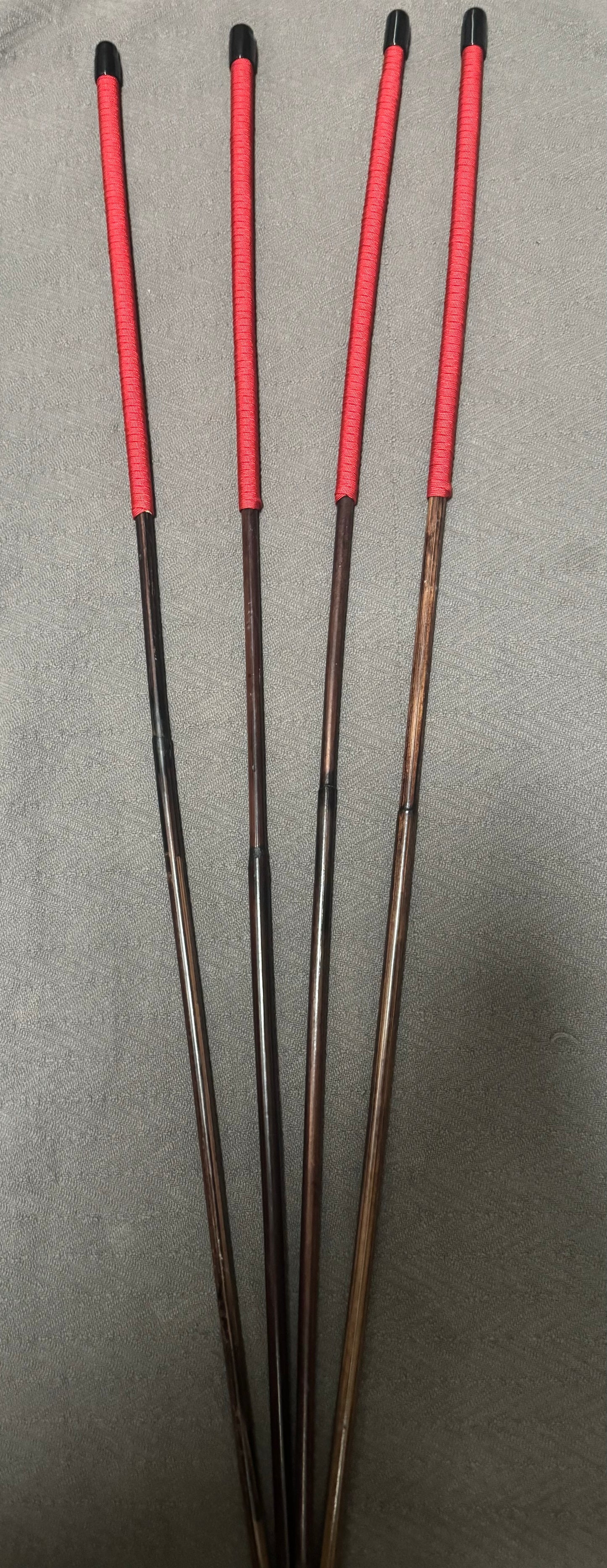 Set of 4 Whippy Swishy Thin Smoked Dragon Canes / Falaka Canes - 90 cms L & 8 - 10 mm D - Imperial Red Paracord Handles - Englishvice Canes