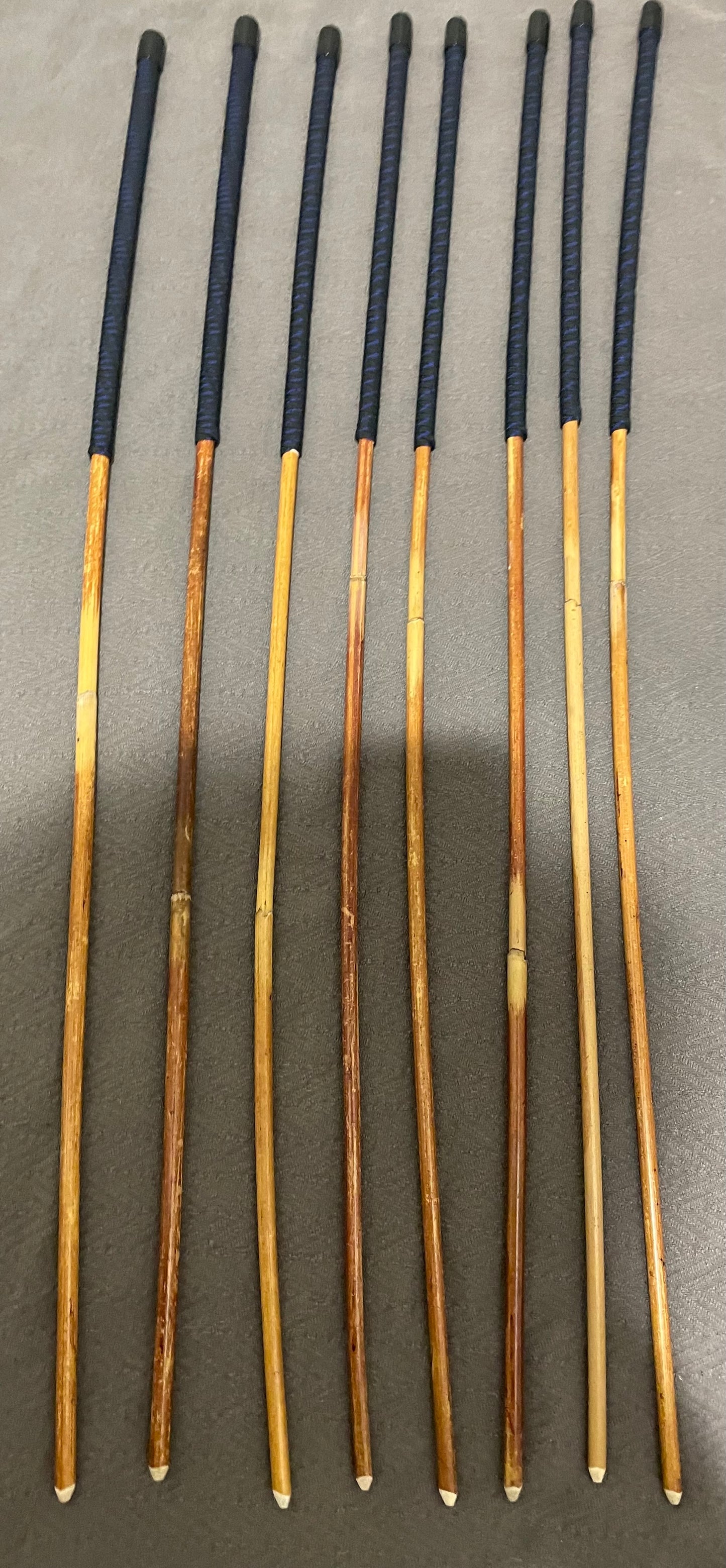 Set of 8 Dragon Rattan Punishment Canes / BDSM Canes with Blue Streak Paracord Handles - SALES SPECIAL - 90 cms Length - Englishvice Canes