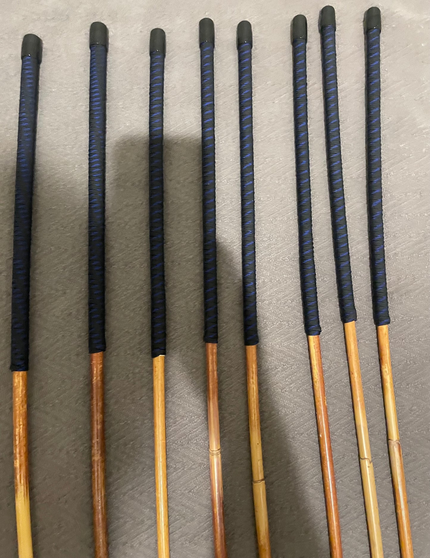 Set of 8 Dragon Rattan Punishment Canes / BDSM Canes with Blue Streak Paracord Handles - SALES SPECIAL - 90 cms Length - Englishvice Canes