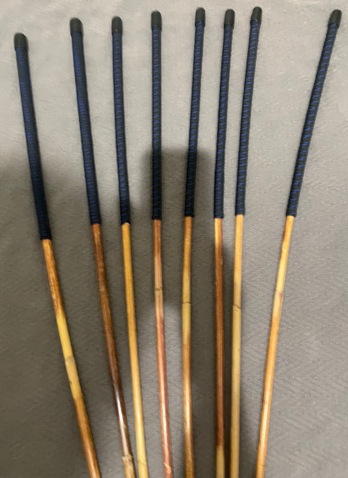 Set of 8 Dragon Rattan Punishment Canes / BDSM Canes with Blue Streak Paracord Handles - SALES SPECIAL - 90 cms Length - Englishvice Canes