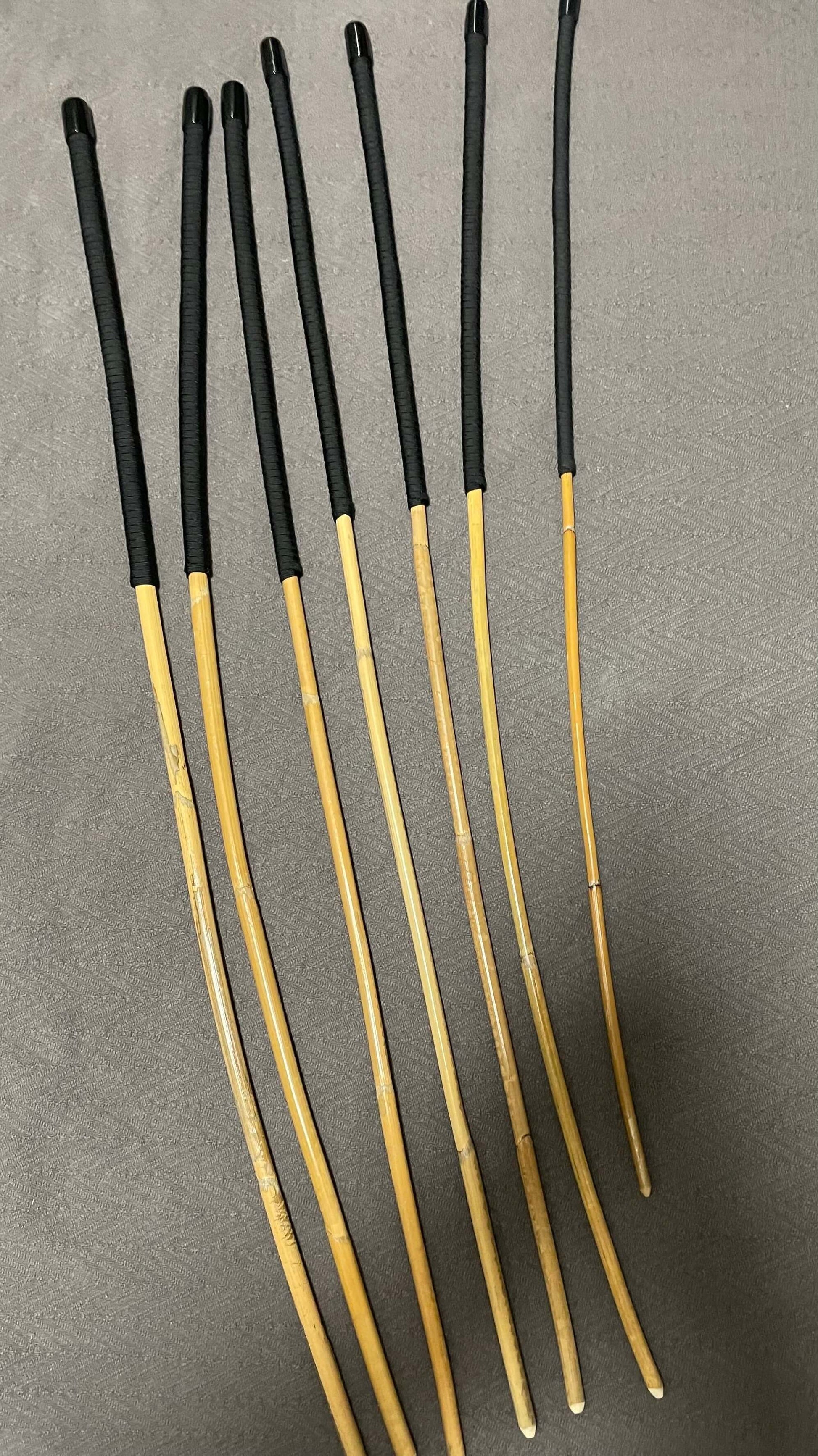 Set of 7 Kooboo Rattan Punishment canes / School Canes / BDSM Canes with Black Paracord Handles -- 72 to 87 cms Length - Englishvice Canes