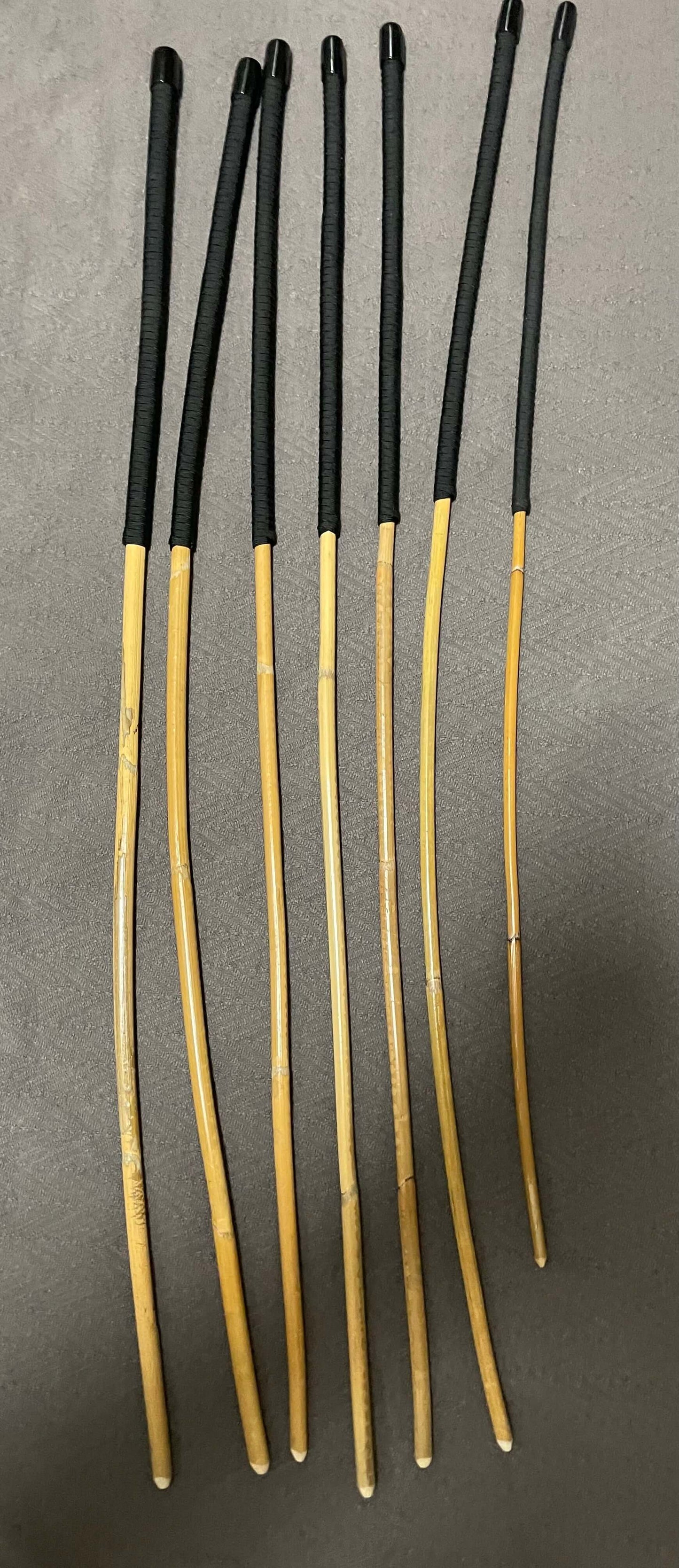 Set of 7 Kooboo Rattan Punishment canes / School Canes / BDSM Canes with Black Paracord Handles -- 72 to 87 cms Length - Englishvice Canes