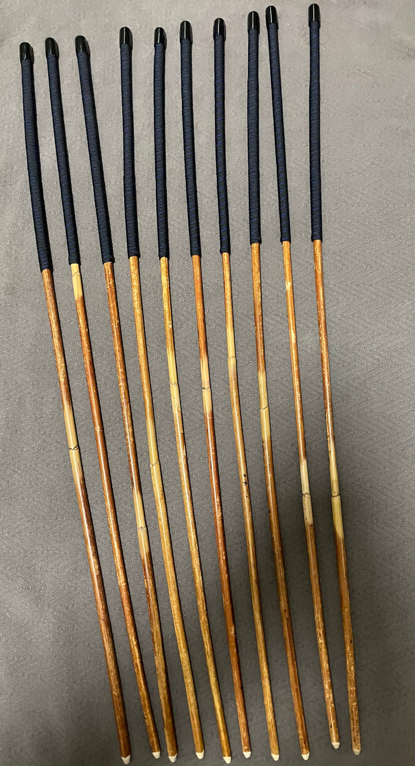 Set of 10 Dragon Rattan Punishment Canes / BDSM Canes with Blue Streak Paracord Handles - SALES SPECIAL - 90 cms Length - Englishvice Canes
