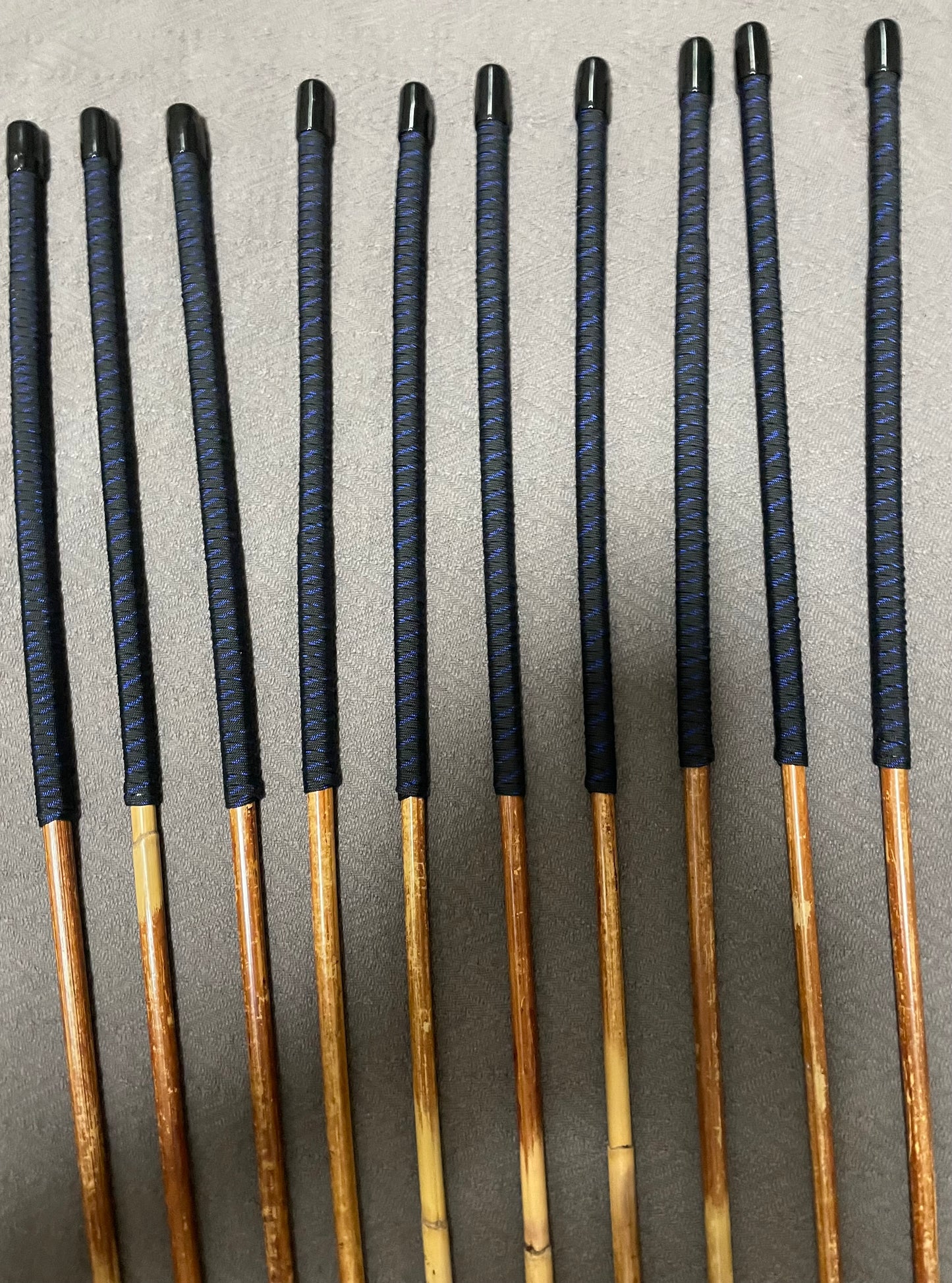Set of 10 Dragon Rattan Punishment Canes / BDSM Canes with Blue Streak Paracord Handles - SALES SPECIAL - 90 cms Length - Englishvice Canes