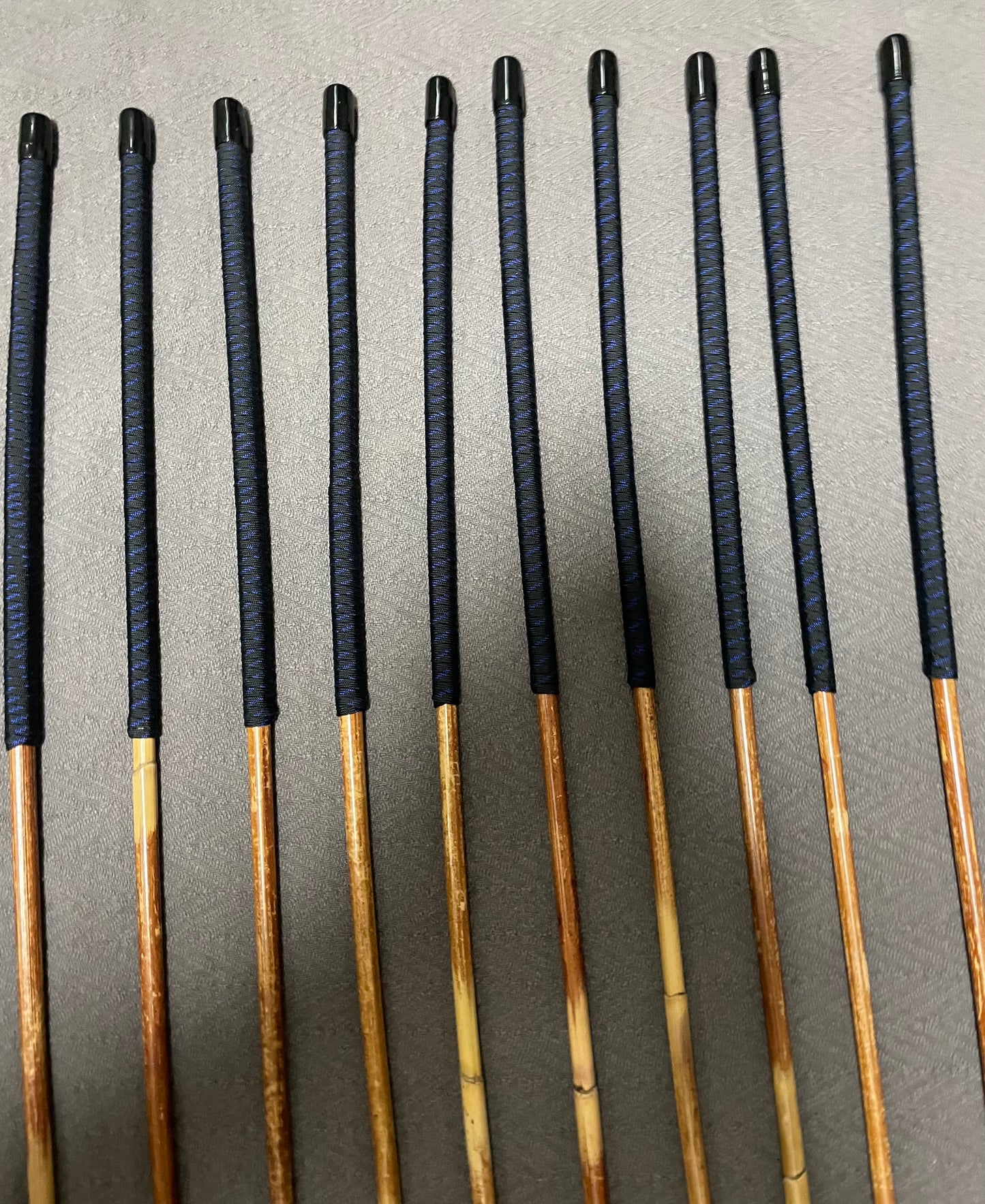 Set of 10 Dragon Rattan Punishment Canes / BDSM Canes with Blue Streak Paracord Handles - SALES SPECIAL - 90 cms Length - Englishvice Canes
