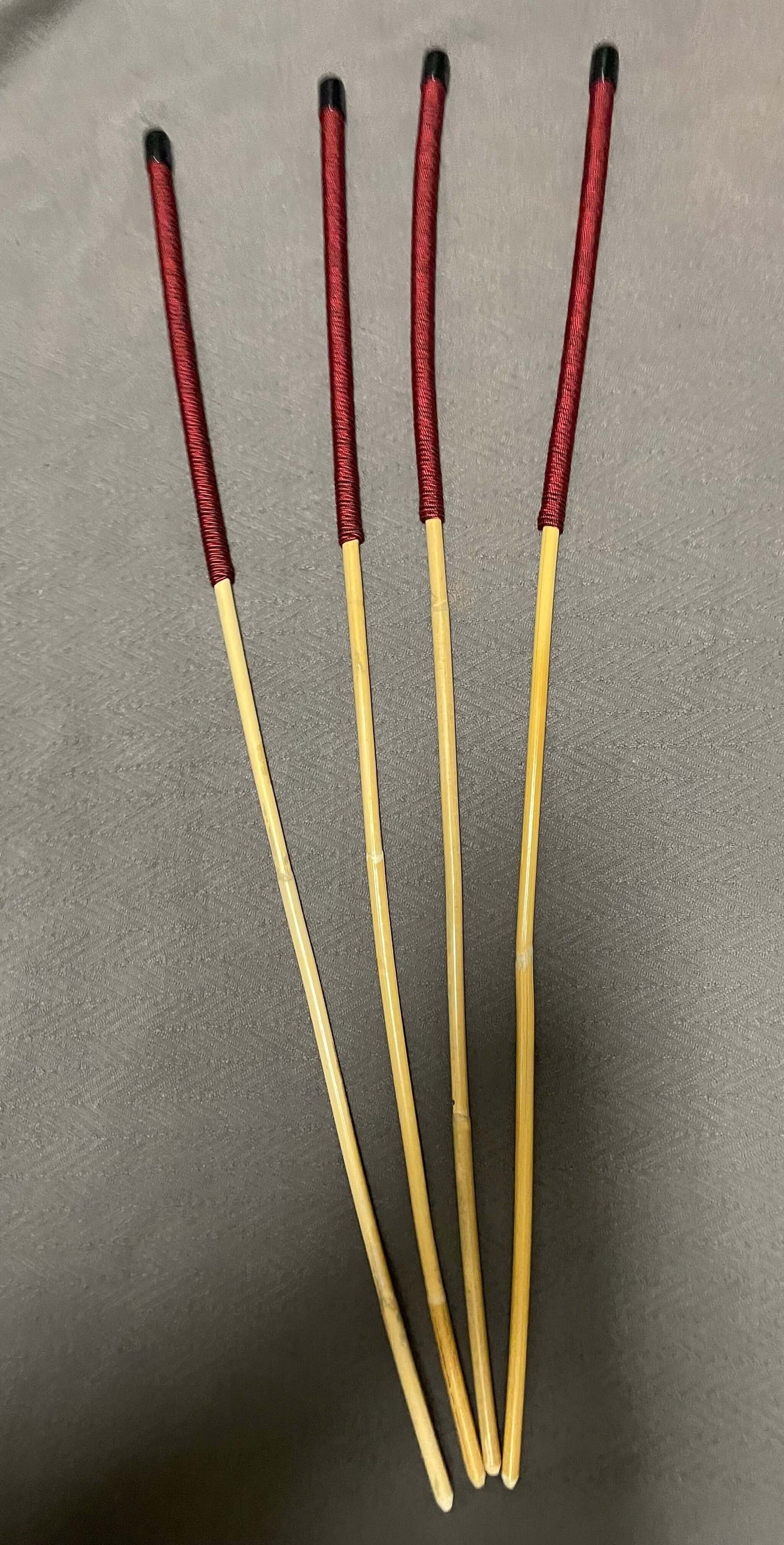 Set of 4 Classic Kooboo Rattan Punishment canes with Liquorice Paracord Handles - 85 to 88 cms Length - 9.5 to 10.5 mm Diameters - Englishvice Canes