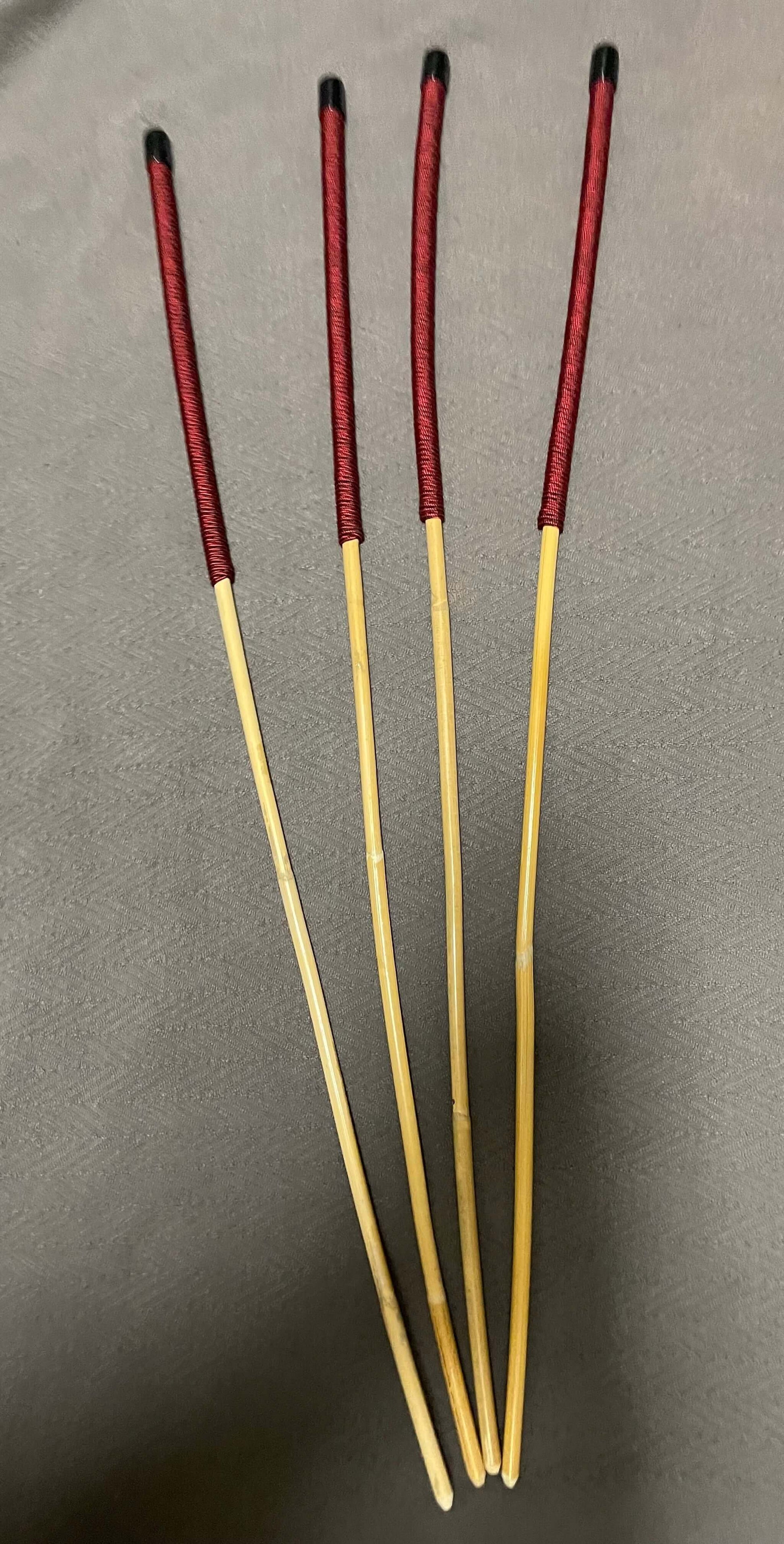 Set of 4 Classic Kooboo Rattan Punishment canes  with Liquorice Paracord Handles - 85 to 88 cms Length - 9.5 to 10.5 mm Diameters - Englishvice Canes