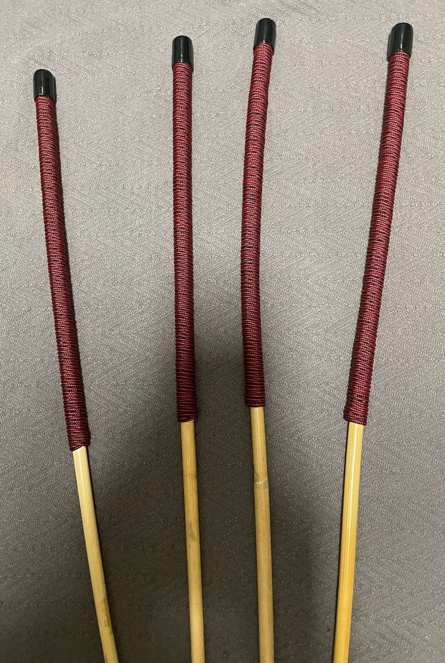 Set of 4 Classic Kooboo Rattan Punishment canes with Liquorice Paracord Handles - 85 to 88 cms Length - 9.5 to 10.5 mm Diameters - Englishvice Canes