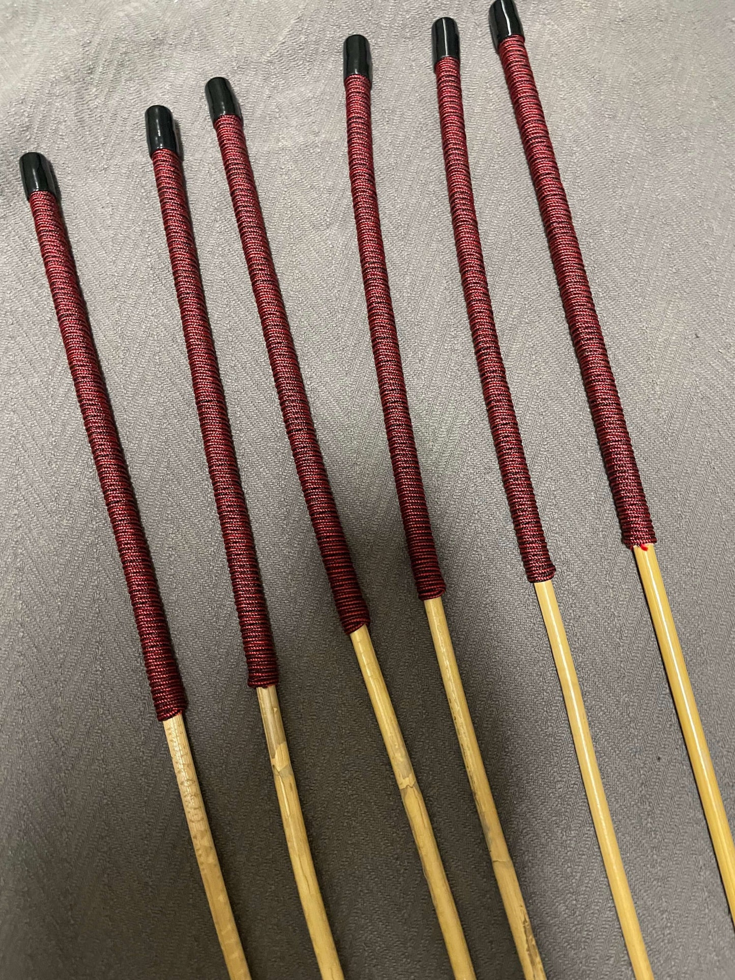 Set of 6 Classic Kooboo Rattan Punishment canes with Liquorice Paracord Handles - 82 to 85 cms Length - 8 to 9.5 mm Diameters - Englishvice Canes