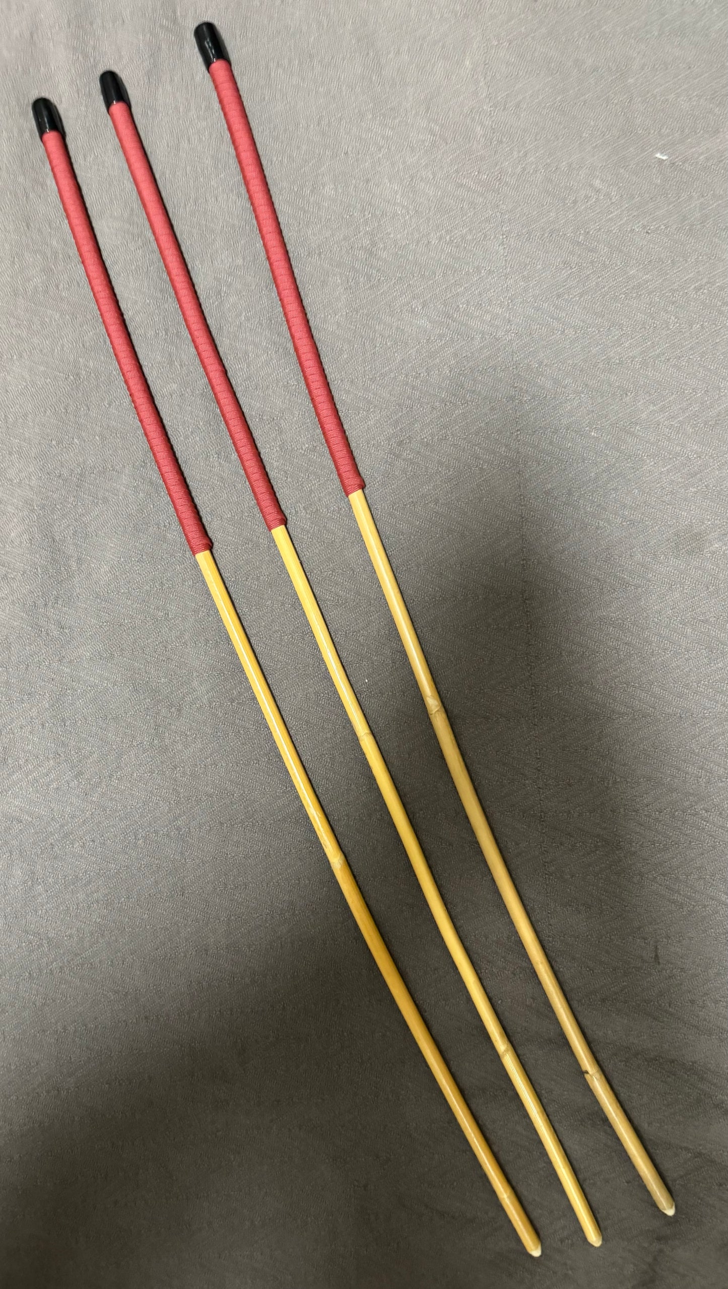 Set of 3 Classic Kooboo Rattan Punishment canes with BRICK RED Paracord Handles - 82 to 84 cms L - 9 - 10 mm D - Englishvice Canes