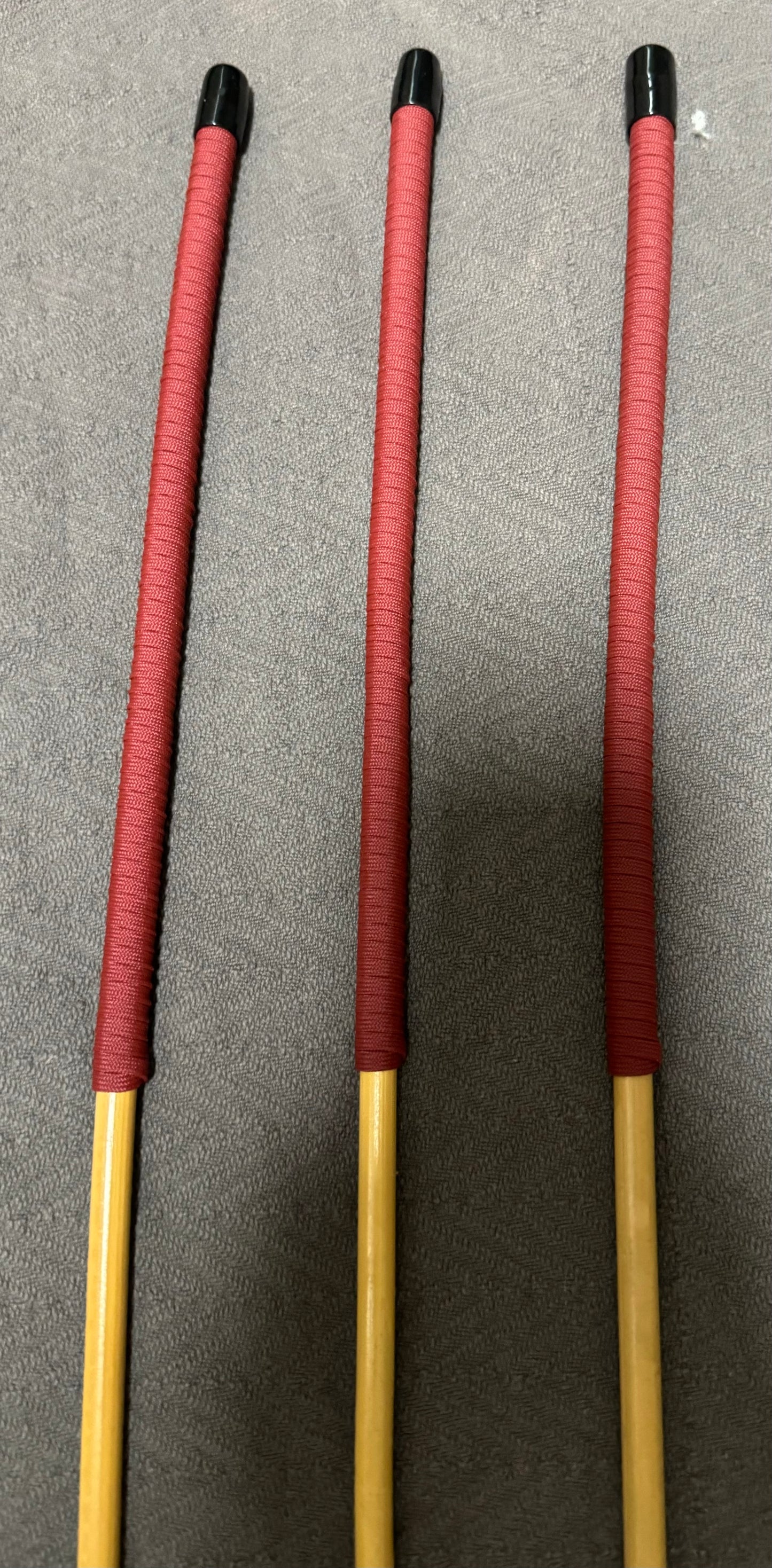 Set of 3 Classic Kooboo Rattan Punishment canes with BRICK RED Paracord Handles - 82 to 84 cms L - 9 - 10 mm D - Englishvice Canes