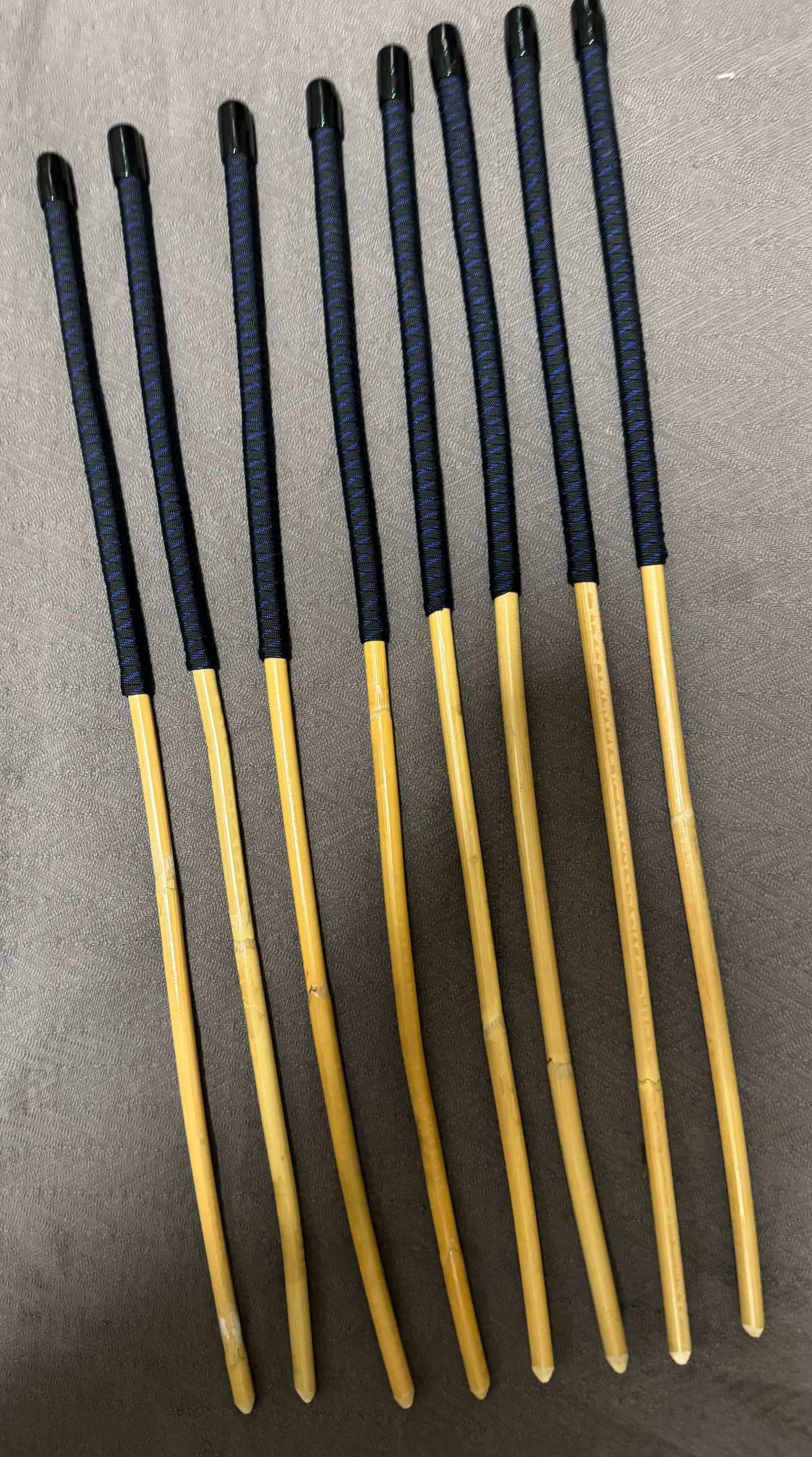 Set of 8 Kooboo Rattan OTK Punishment canes with BLUE STREAK Paracord Handles - 60 cms L & 9 - 11.5 mm D - Englishvice Canes