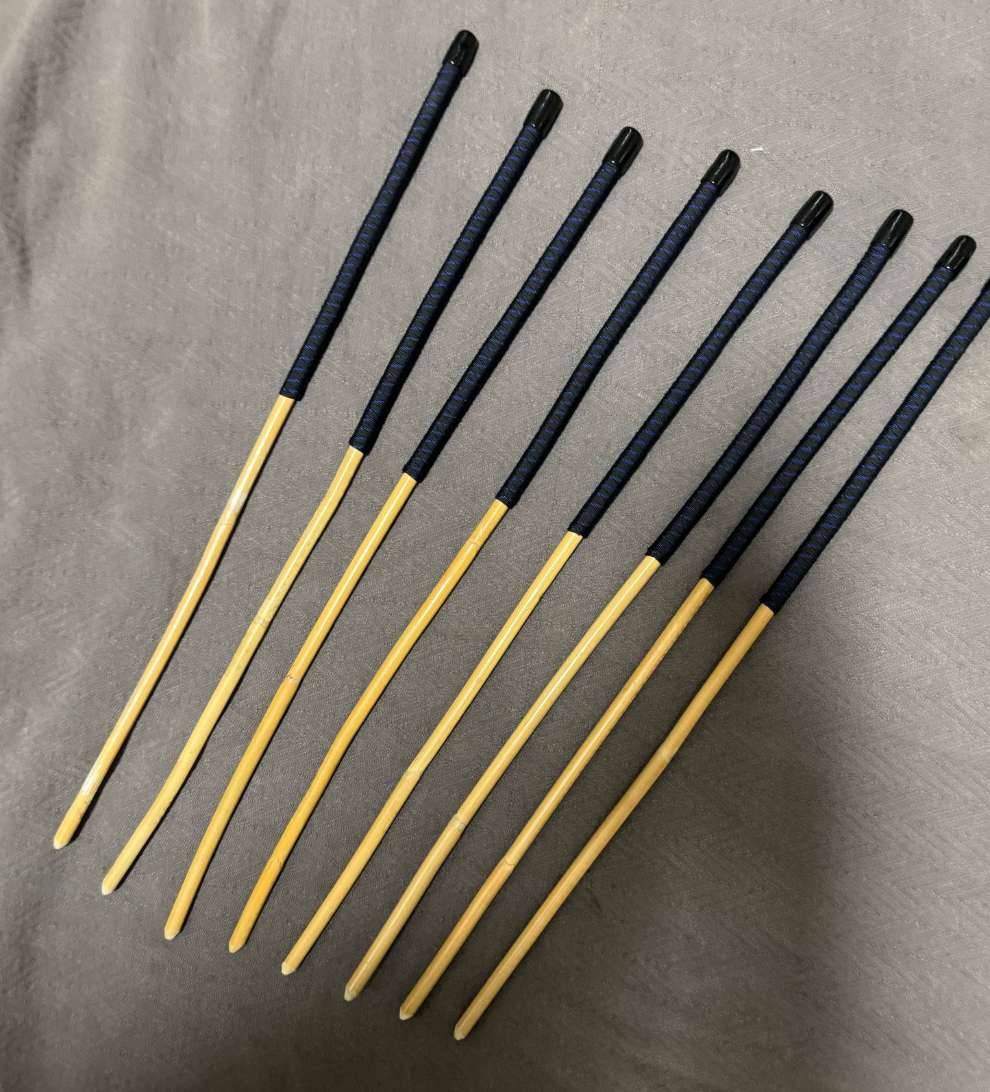 Set of 8 Kooboo Rattan OTK Punishment canes with BLUE STREAK Paracord Handles - 60 cms L & 9 - 11.5 mm D - Englishvice Canes