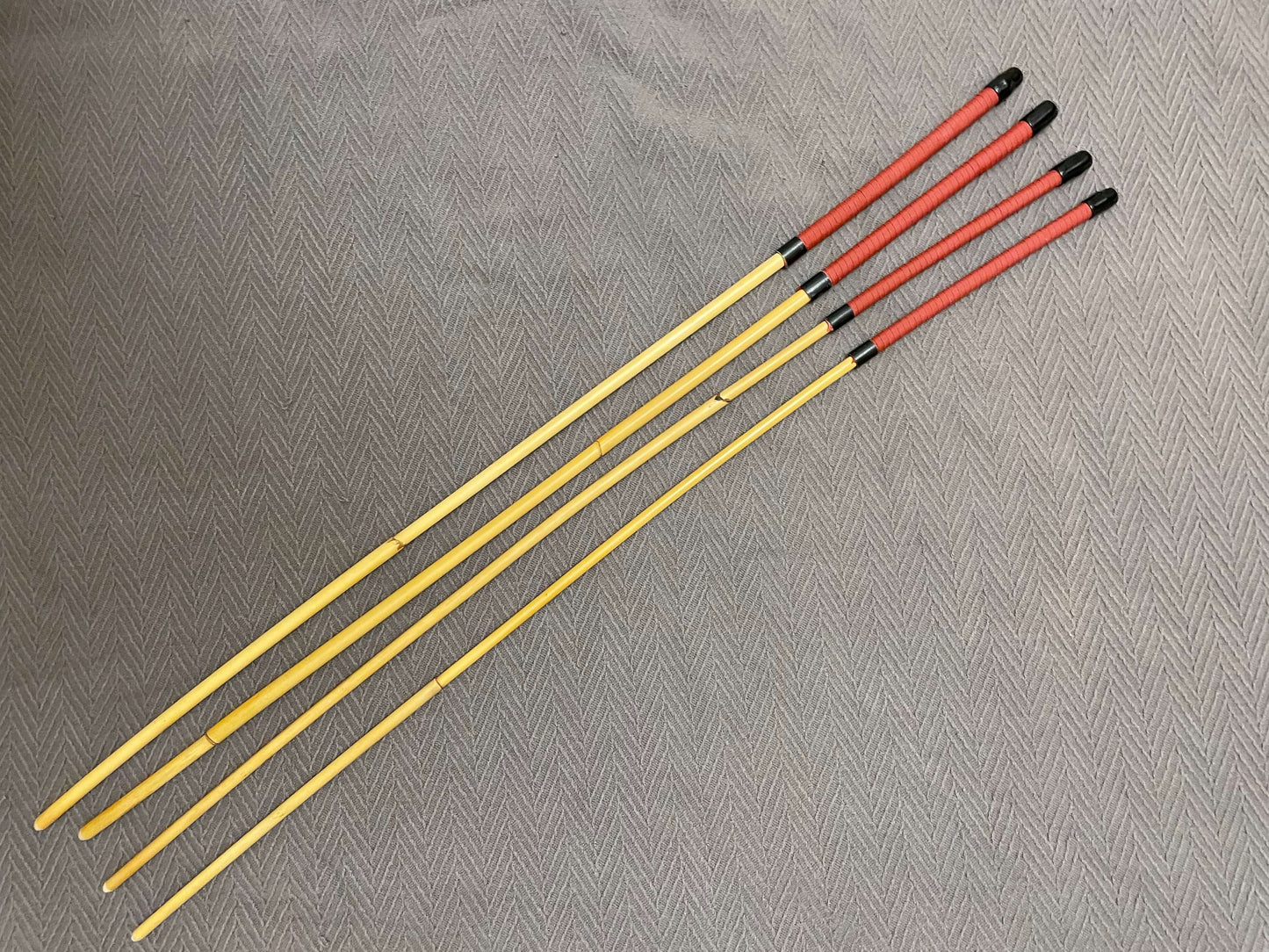 Set of 4 Dragon Canes / School Rattan Canes with Red Paracord Handles