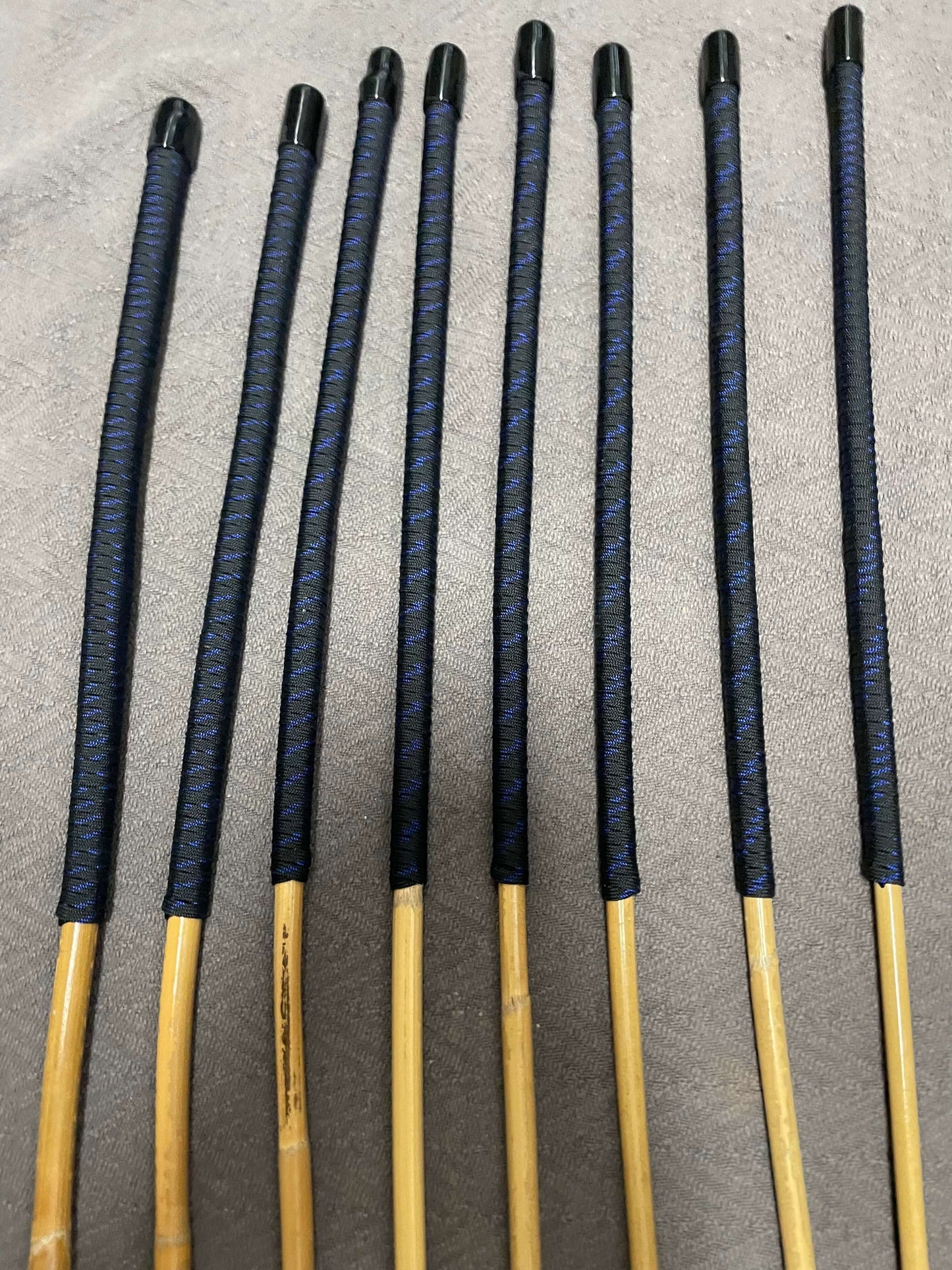 Set of 8 Kooboo Rattan Punishment canes - Blue Streak Paracord Handles - 83 to 87 cms Length - Englishvice Canes