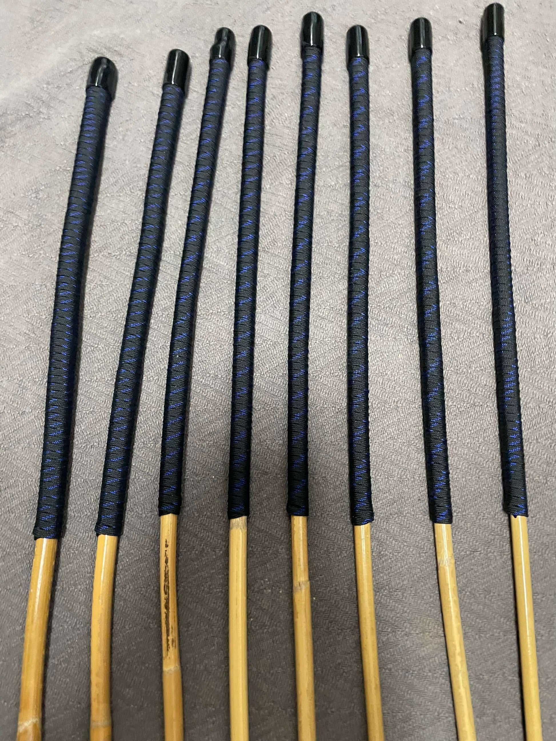 Set of 8 Kooboo Rattan Punishment canes - Blue Streak Paracord Handles - 83 to 87 cms Length - Englishvice Canes