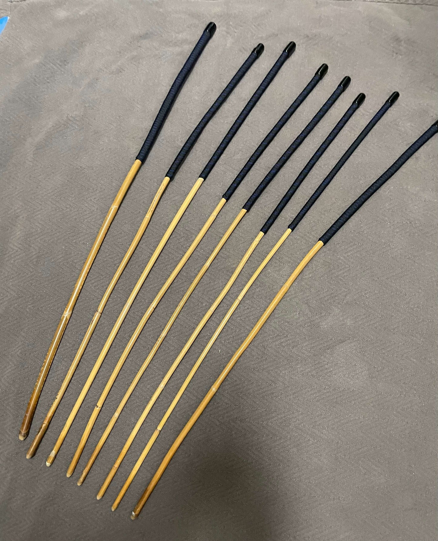 Set of 8 Kooboo Rattan Punishment canes - Blue Streak Paracord Handles - 83 to 87 cms Length - Englishvice Canes