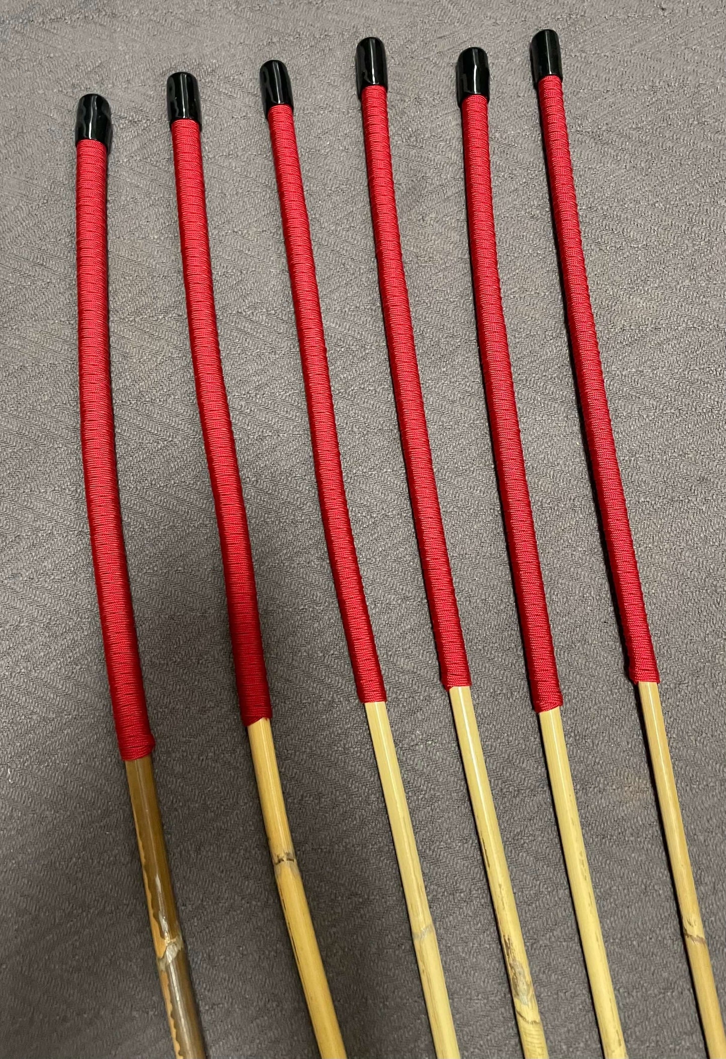 Set of 6 Kooboo Rattan Punishment canes Imperial Red Paracord Handles 83 to 87 cms Length - Englishvice Canes
