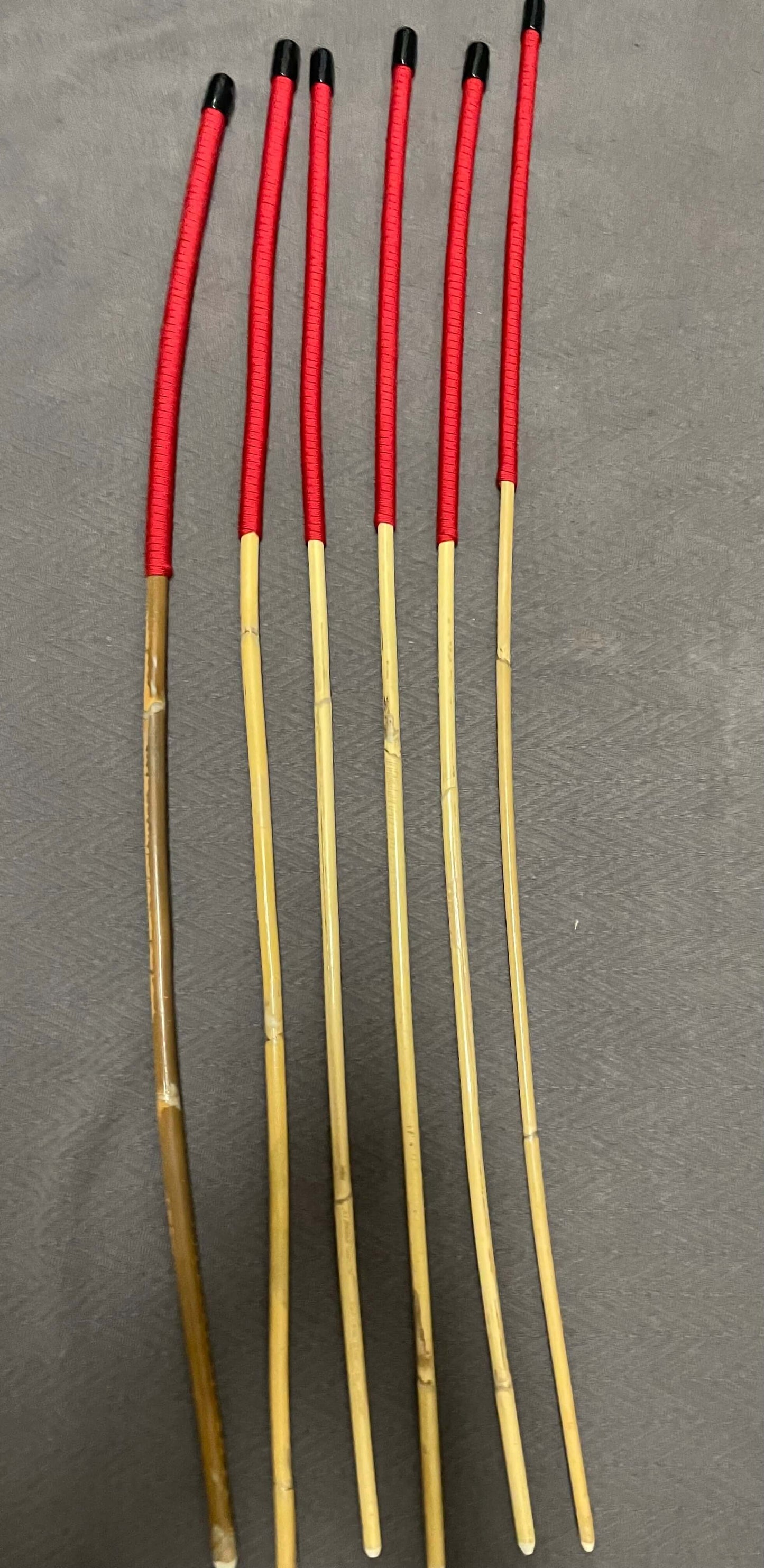 Set of 6 Kooboo Rattan Punishment canes Imperial Red Paracord Handles 83 to 87 cms Length - Englishvice Canes