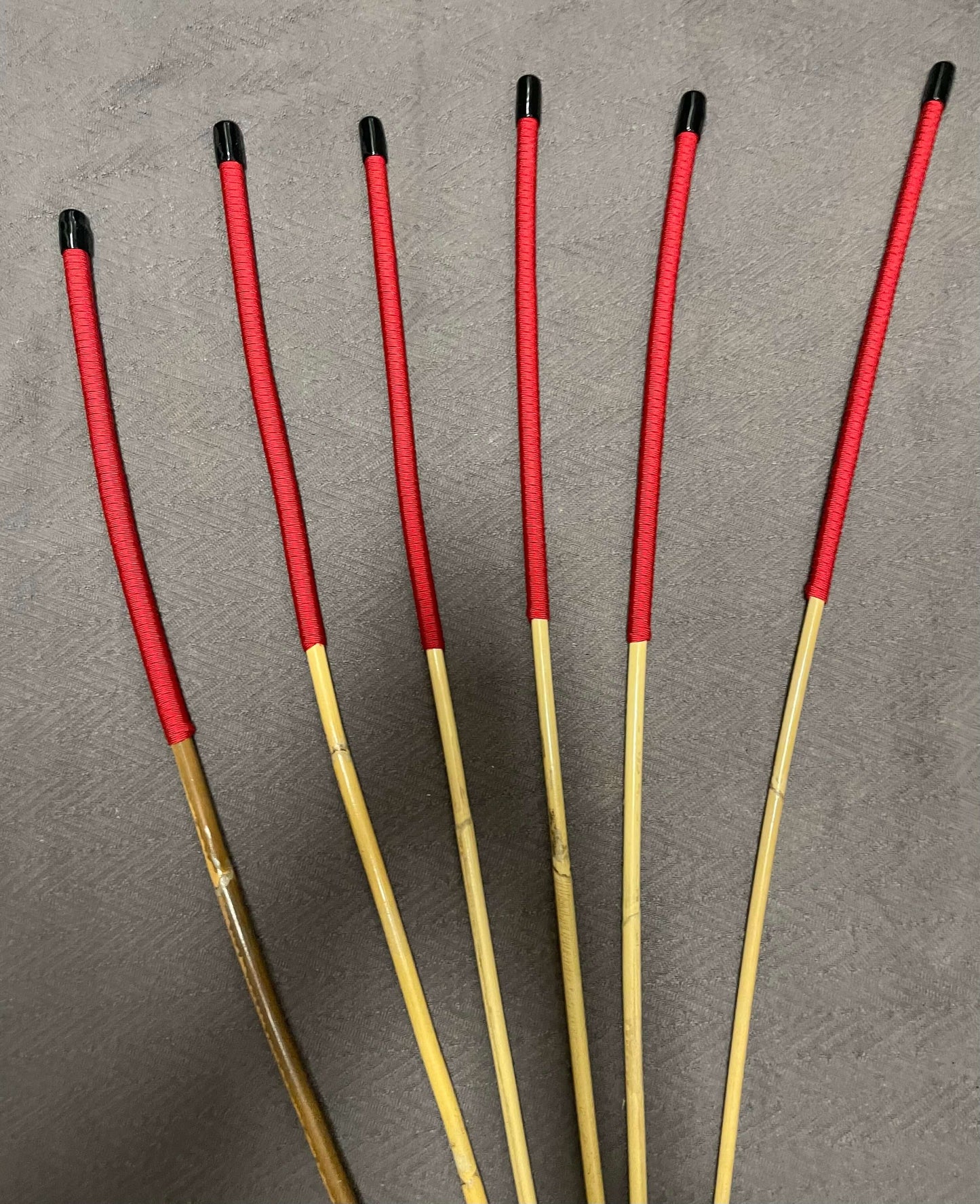 Set of 6 Kooboo Rattan Punishment canes Imperial Red Paracord Handles 83 to 87 cms Length - Englishvice Canes