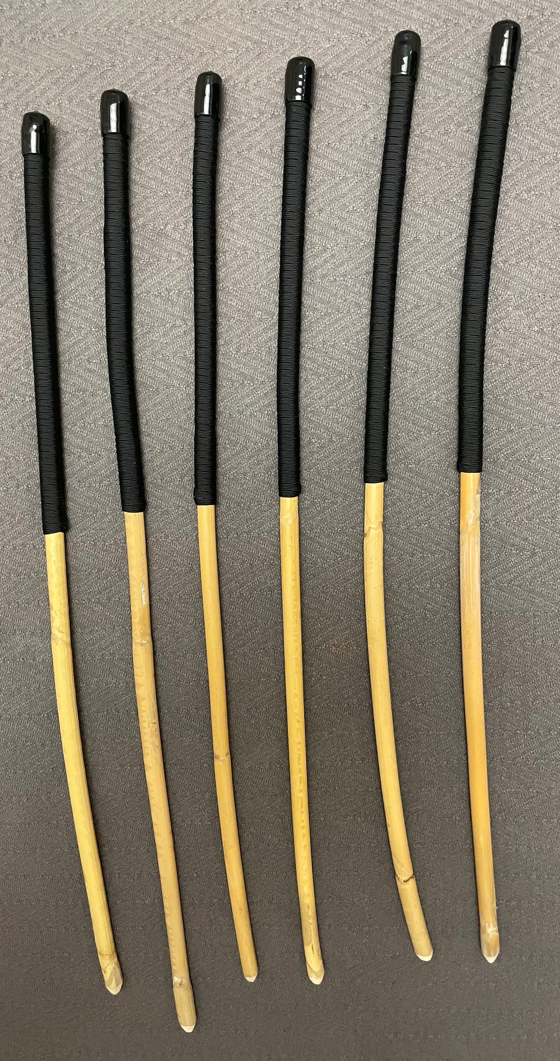 Set of 6 Classic Kooboo Rattan OTK Punishment canes with RED Paracord Handles - Over the Knee OTK Cane Set