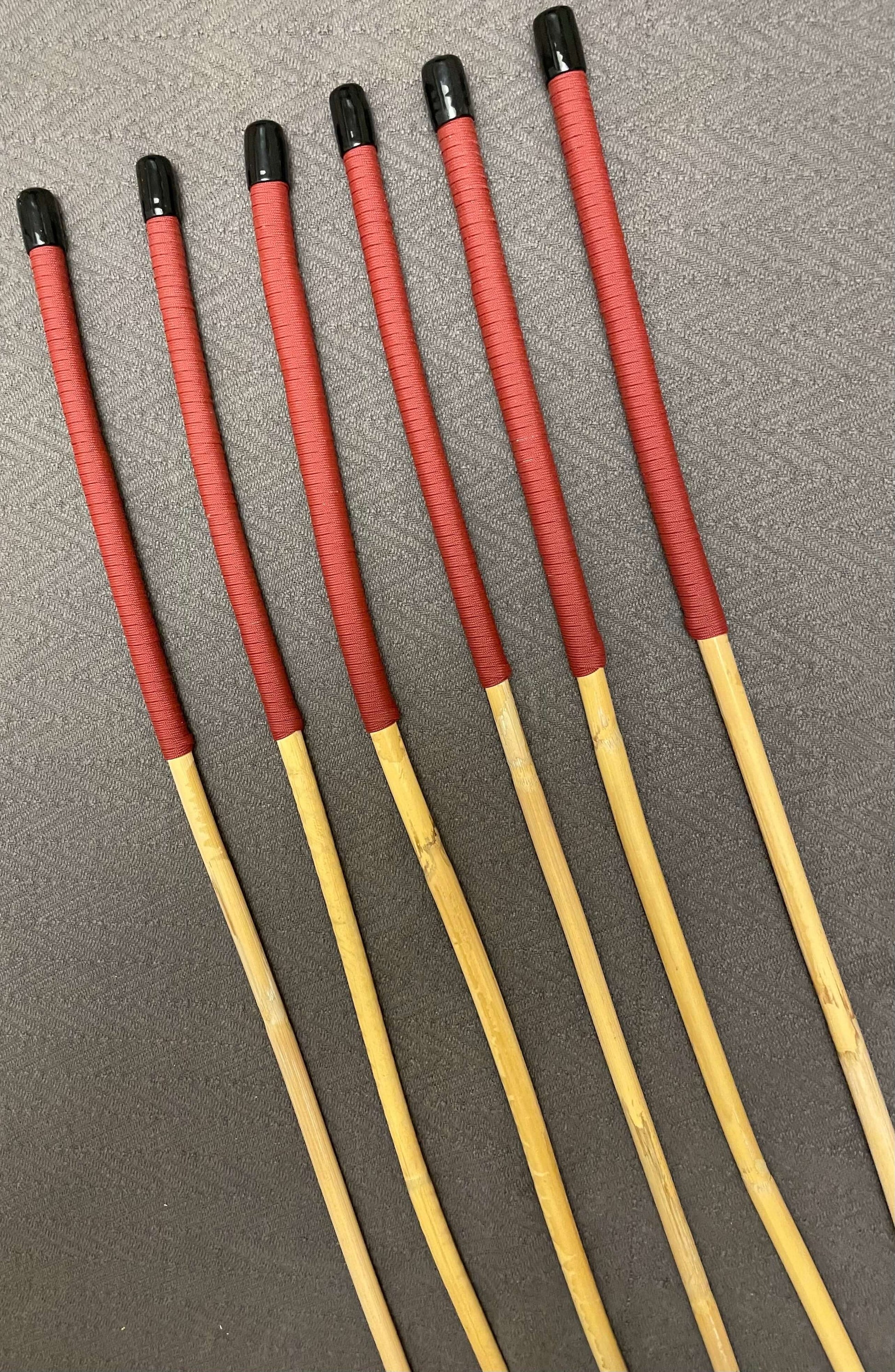 Set of 6 Classic Kooboo Rattan Punishment canes with RED Paracord Handles - Beginner / Novice Cane Set