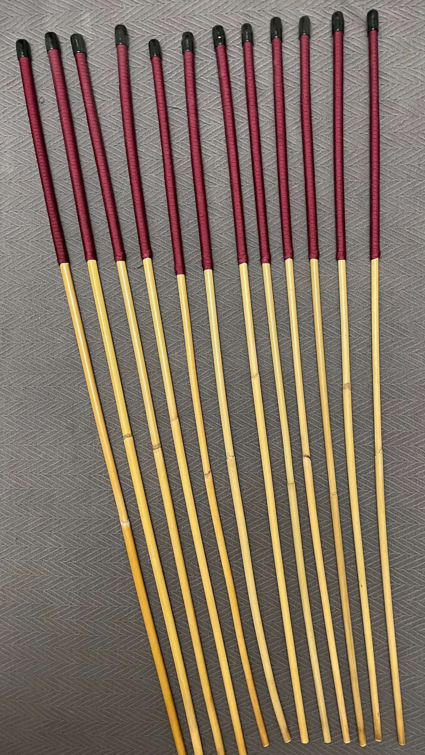Set of 12 Dragon Rattan Canes / Punishment Canes wirh Burgundy Paracord Handles