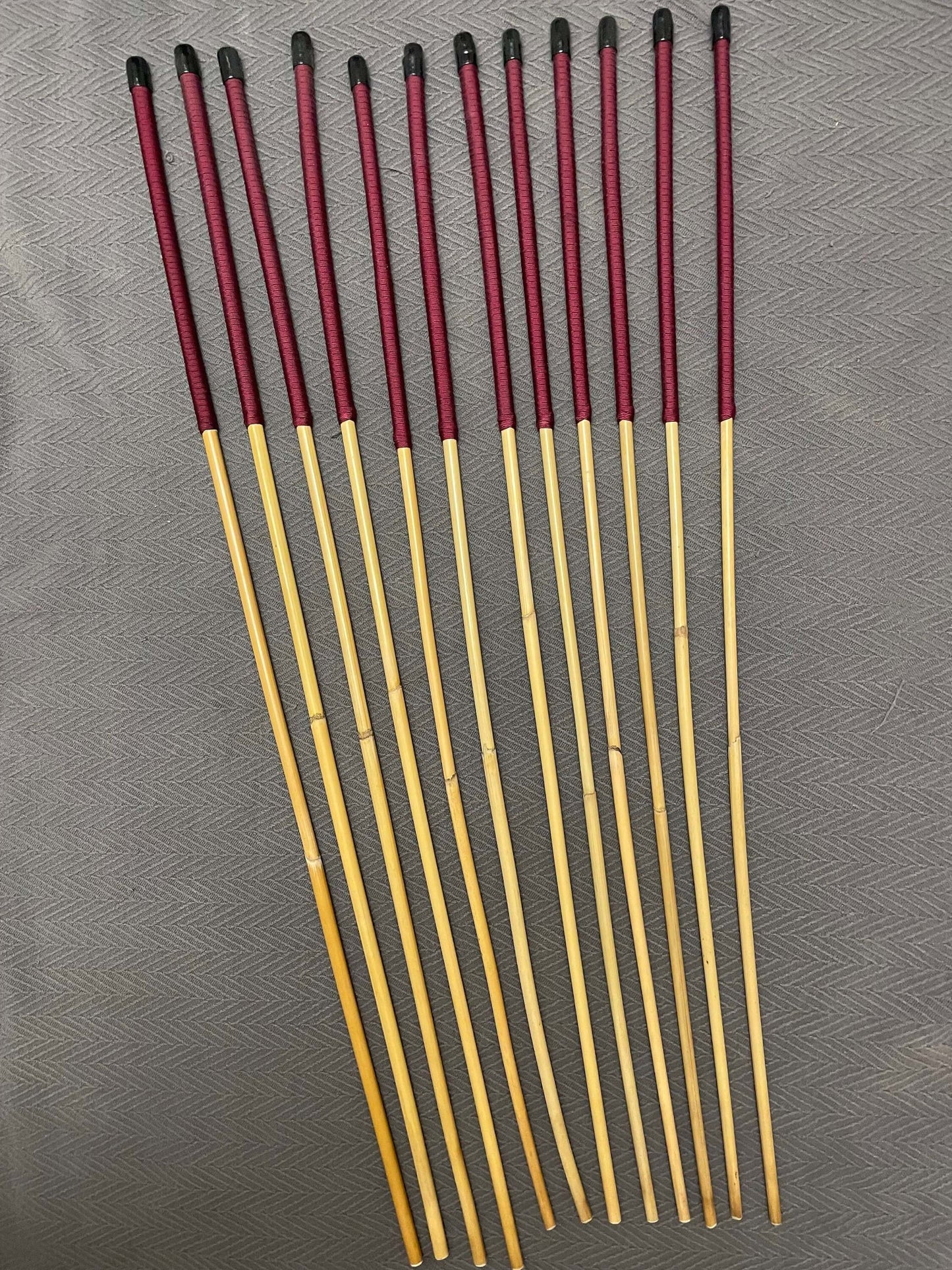 Set of 12 Dragon Rattan Canes / Punishment Canes wirh Burgundy Paracord Handles