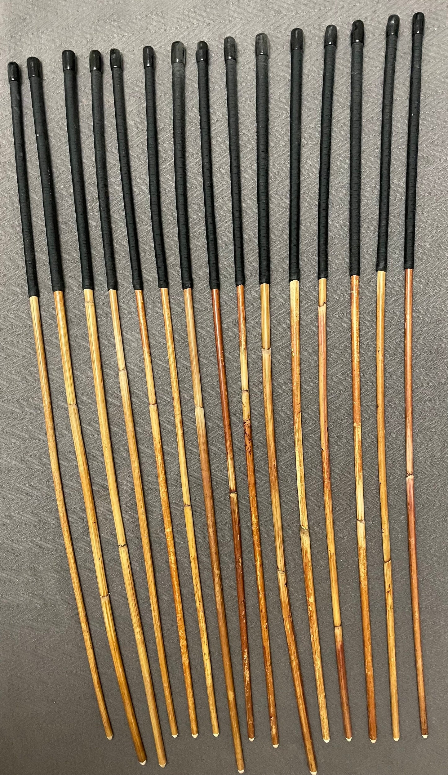 Set of 15 Classic Dragon Rattan Punishment Canes with Black Paracord Handles - 95 to 100 cms Length - Sales Special