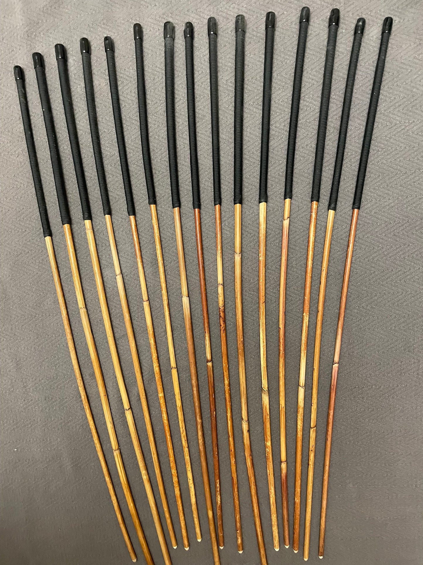 Set of 15 Classic Dragon Rattan Punishment Canes with Black Paracord Handles - 95 to 100 cms Length - Sales Special