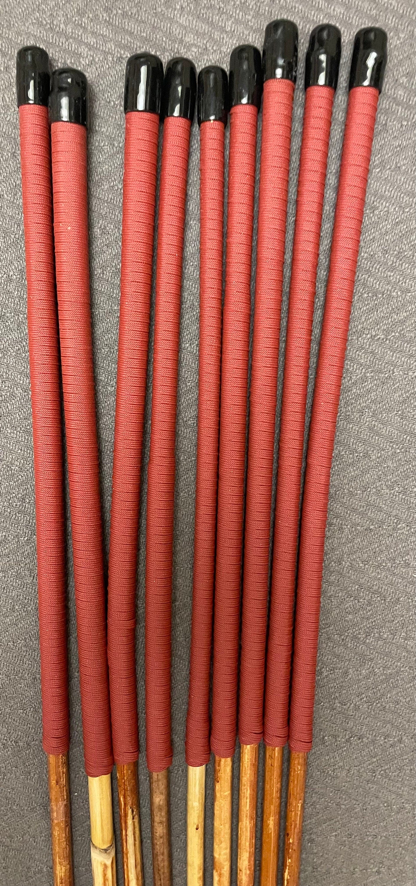 Set of 9 Classic Dragon Rattan Punishment Canes / BDSM Canes with Brick Red Paracord Handles - 95 cms Length - Englishvice Canes