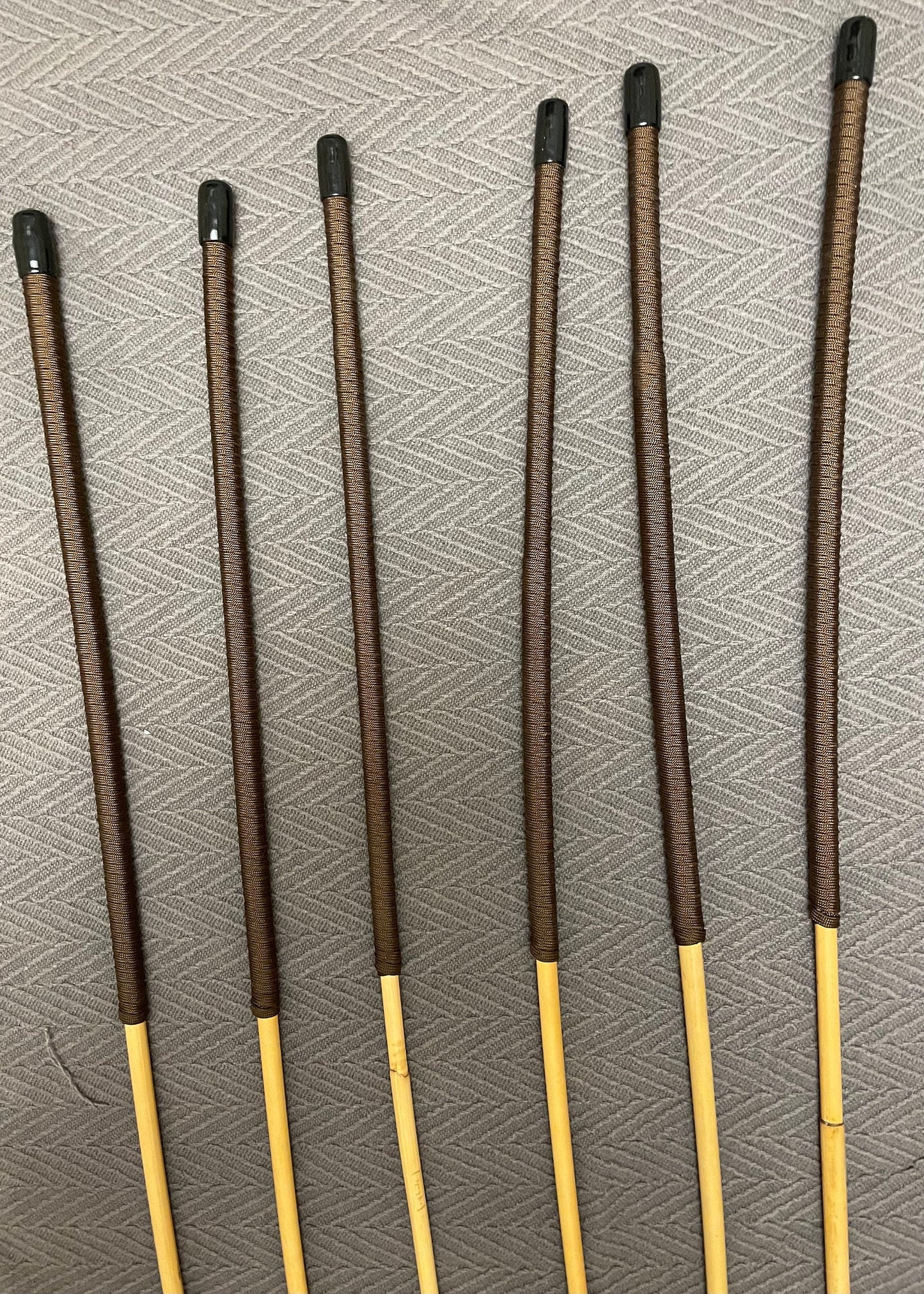 The Stinger Six Set of 6 Whippy Thin Swishy Dragon Canes with Brown Paracord Handles - 95 cms Length
