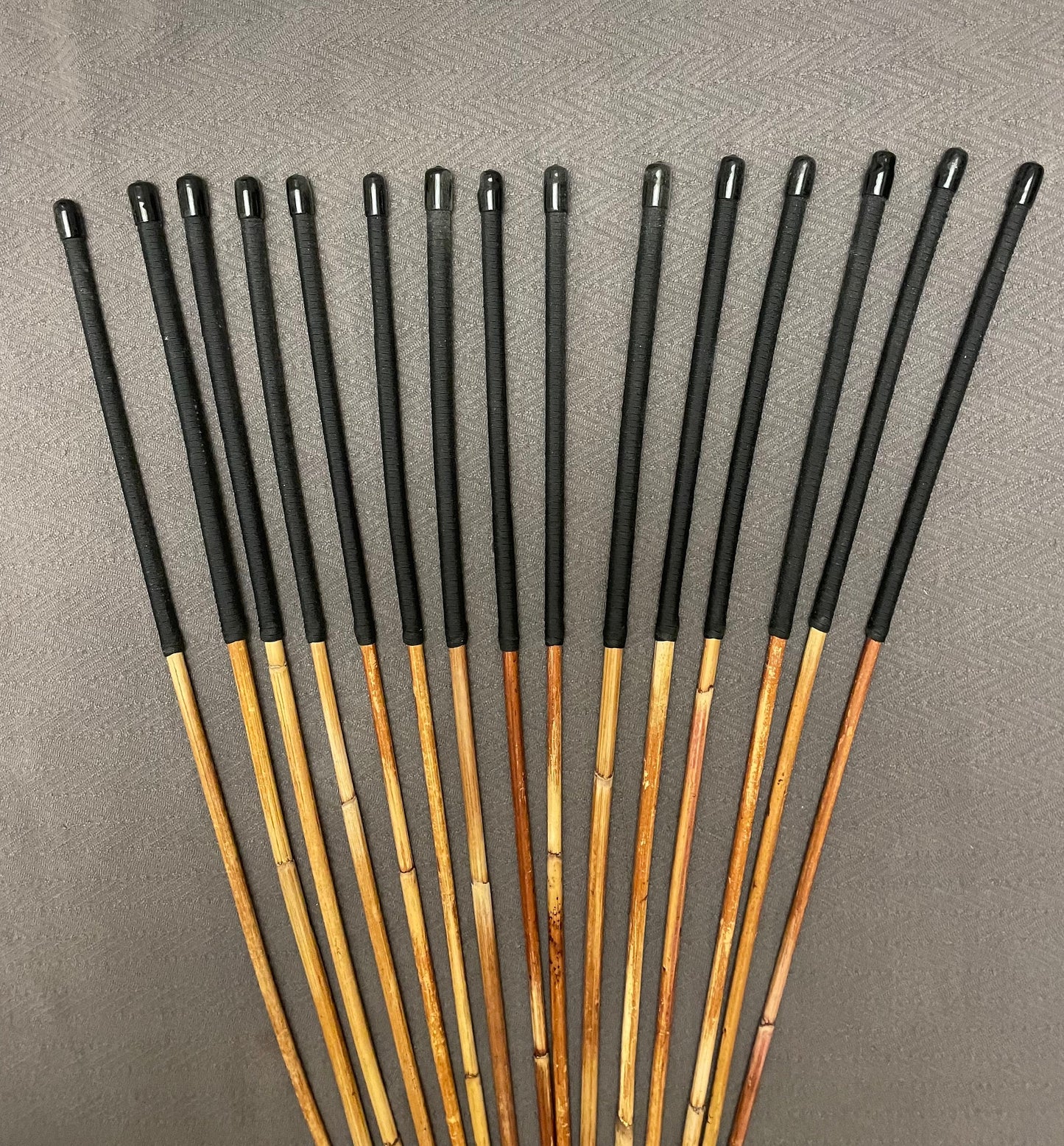 Set of 15 Classic Dragon Rattan Punishment Canes with Black Paracord Handles - 95 to 100 cms Length - Sales Special