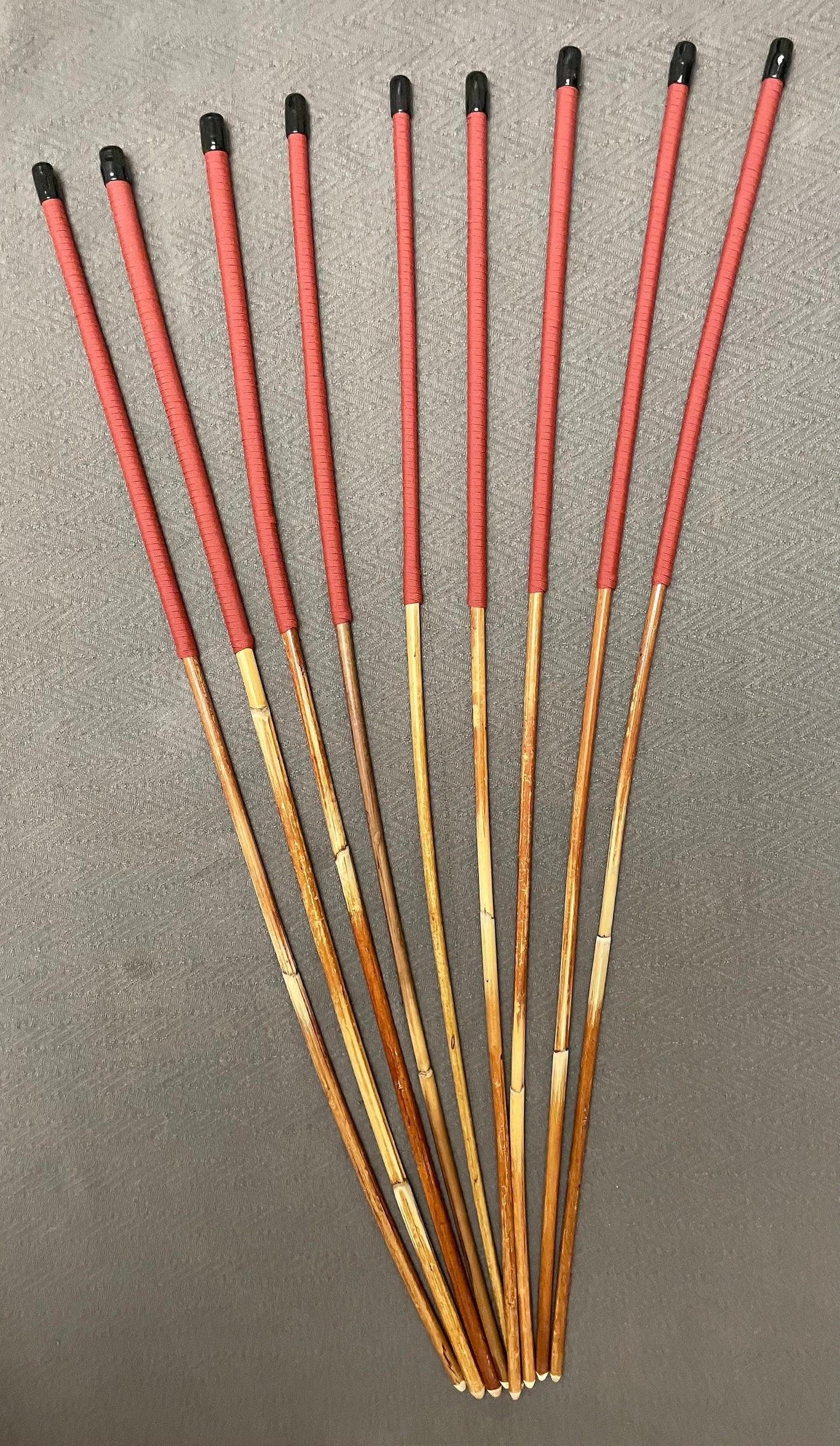 Set of 9 Classic Dragon Rattan Punishment Canes / BDSM Canes with Brick Red Paracord Handles - 95 cms Length - Englishvice Canes
