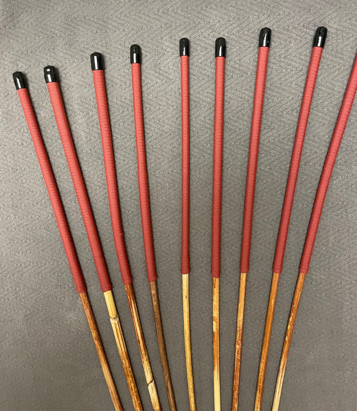 Set of 9 Classic Dragon Rattan Punishment Canes / BDSM Canes with Brick Red Paracord Handles - 95 cms Length - Englishvice Canes