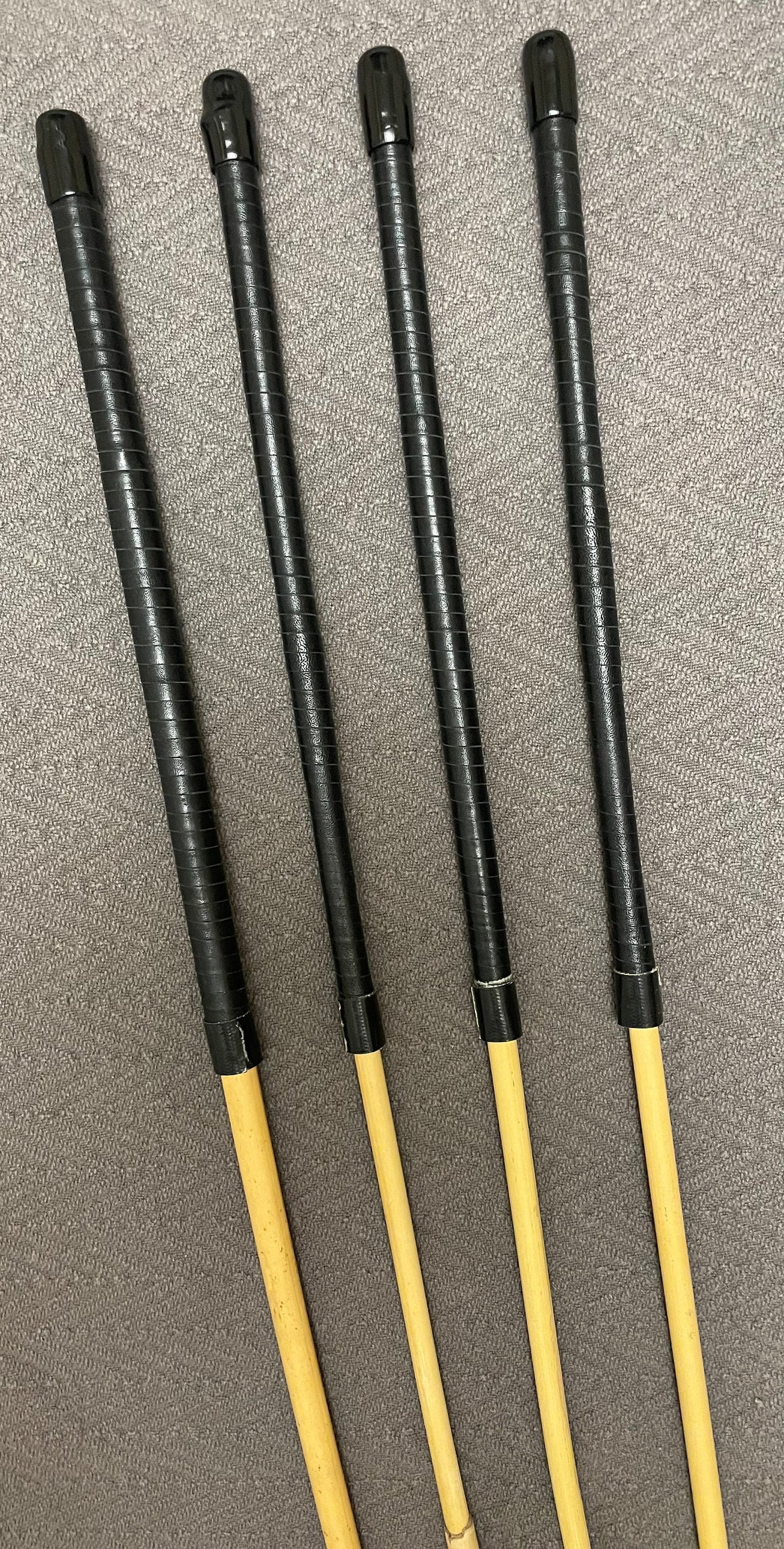 Pro Disciplinarian Set of 4 Classic Dragon Rattan Punishment Canes / Whipping Canes with Black Kangaroo Leather Handles
