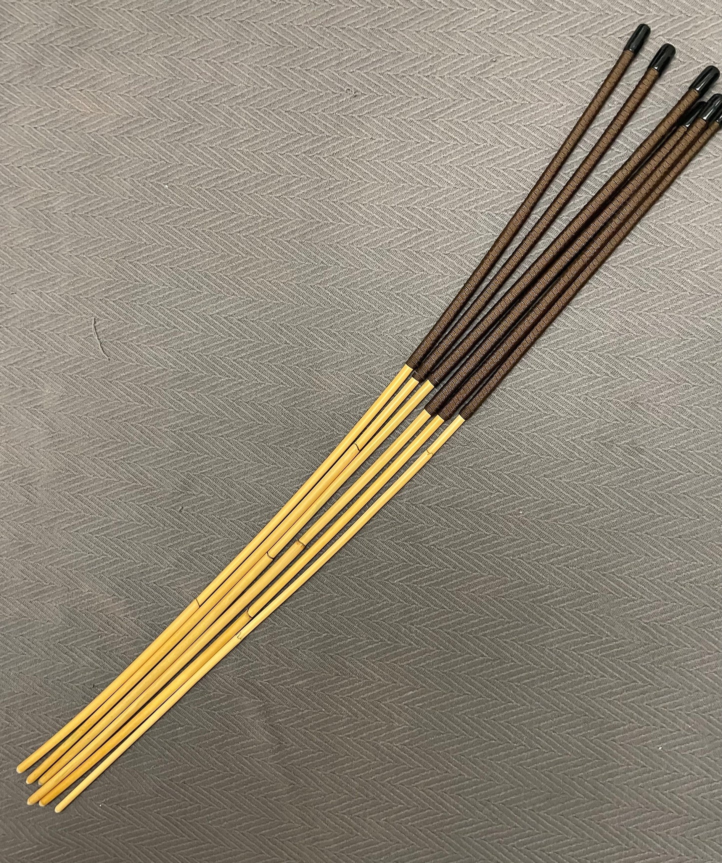 The Stinger Six Set of 6 Whippy Thin Swishy Dragon Canes with Brown Paracord Handles - 95 cms Length