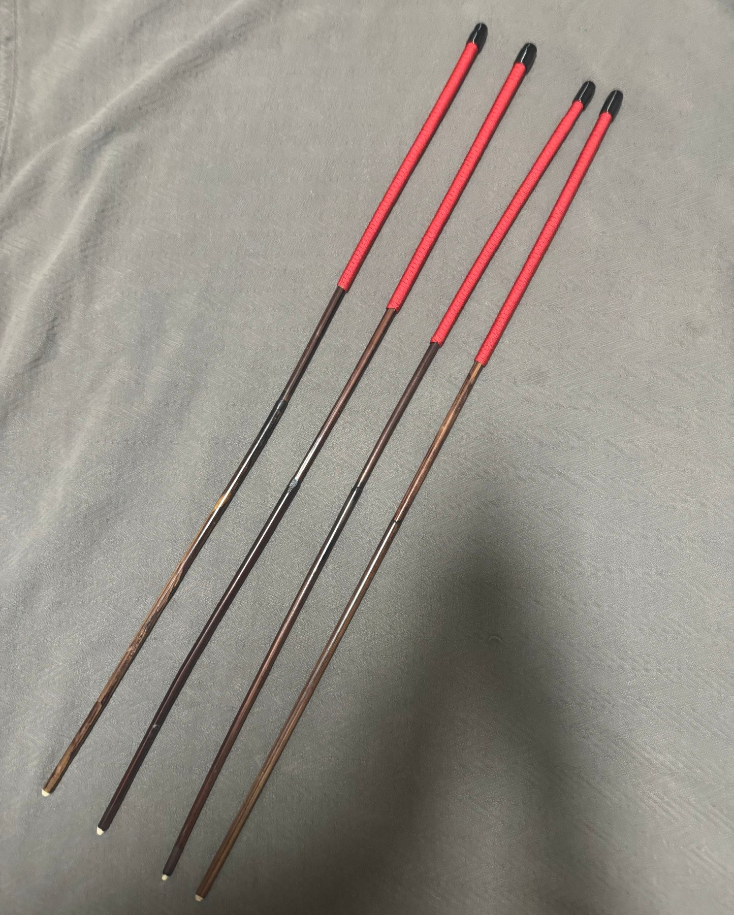 Set of 4 Whippy Swishy Thin Smoked Dragon Canes / Falaka Canes - 90 cms L & 8 - 10 mm D - Imperial Red Paracord Handles - Englishvice Canes