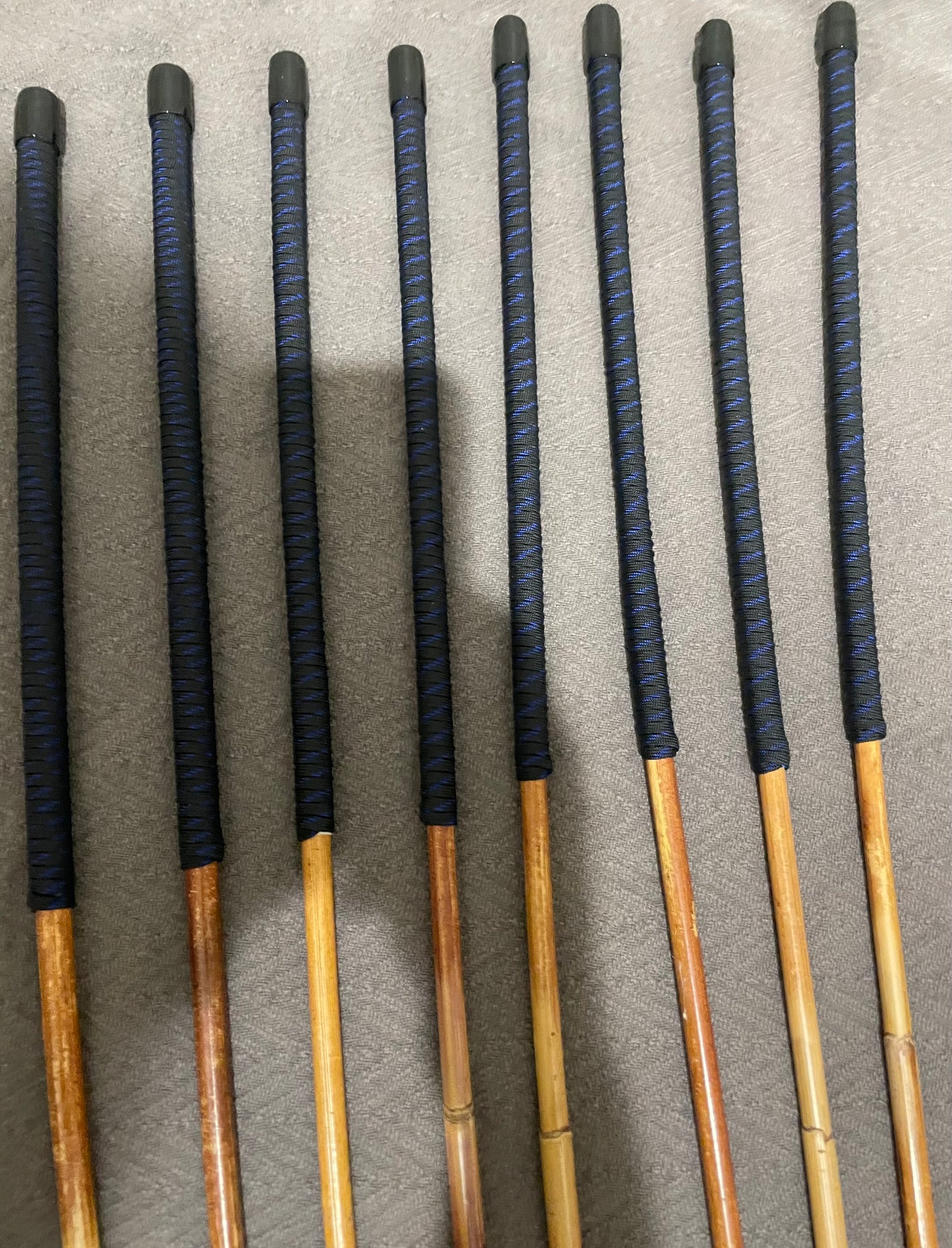 Set of 8 Dragon Rattan Punishment Canes / BDSM Canes with Blue Streak Paracord Handles - SALES SPECIAL - 90 cms Length - Englishvice Canes 