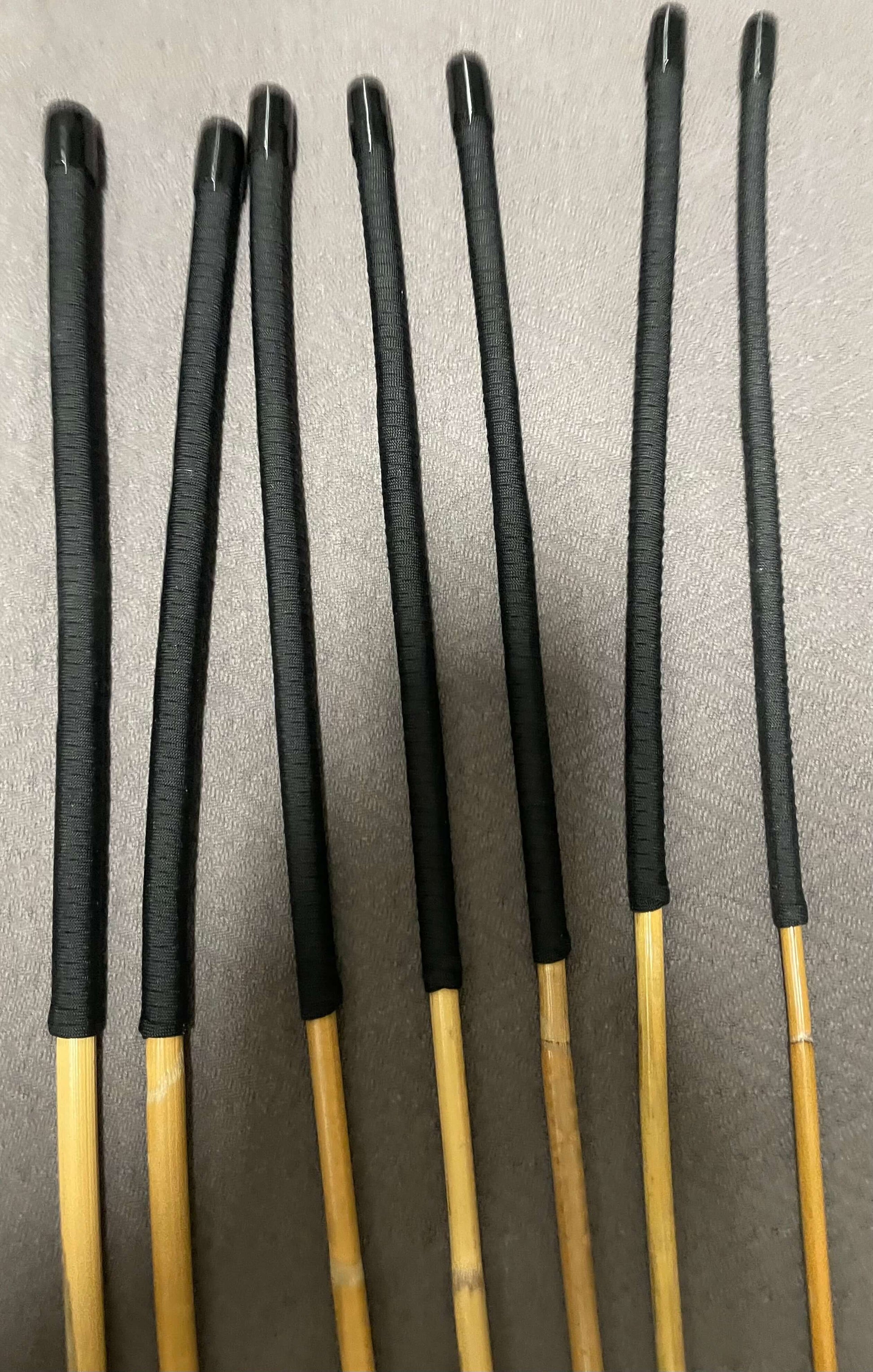 Set of 7 Kooboo Rattan Punishment canes / School Canes / BDSM Canes with Black Paracord Handles -- 72 to 87 cms Length - Englishvice Canes