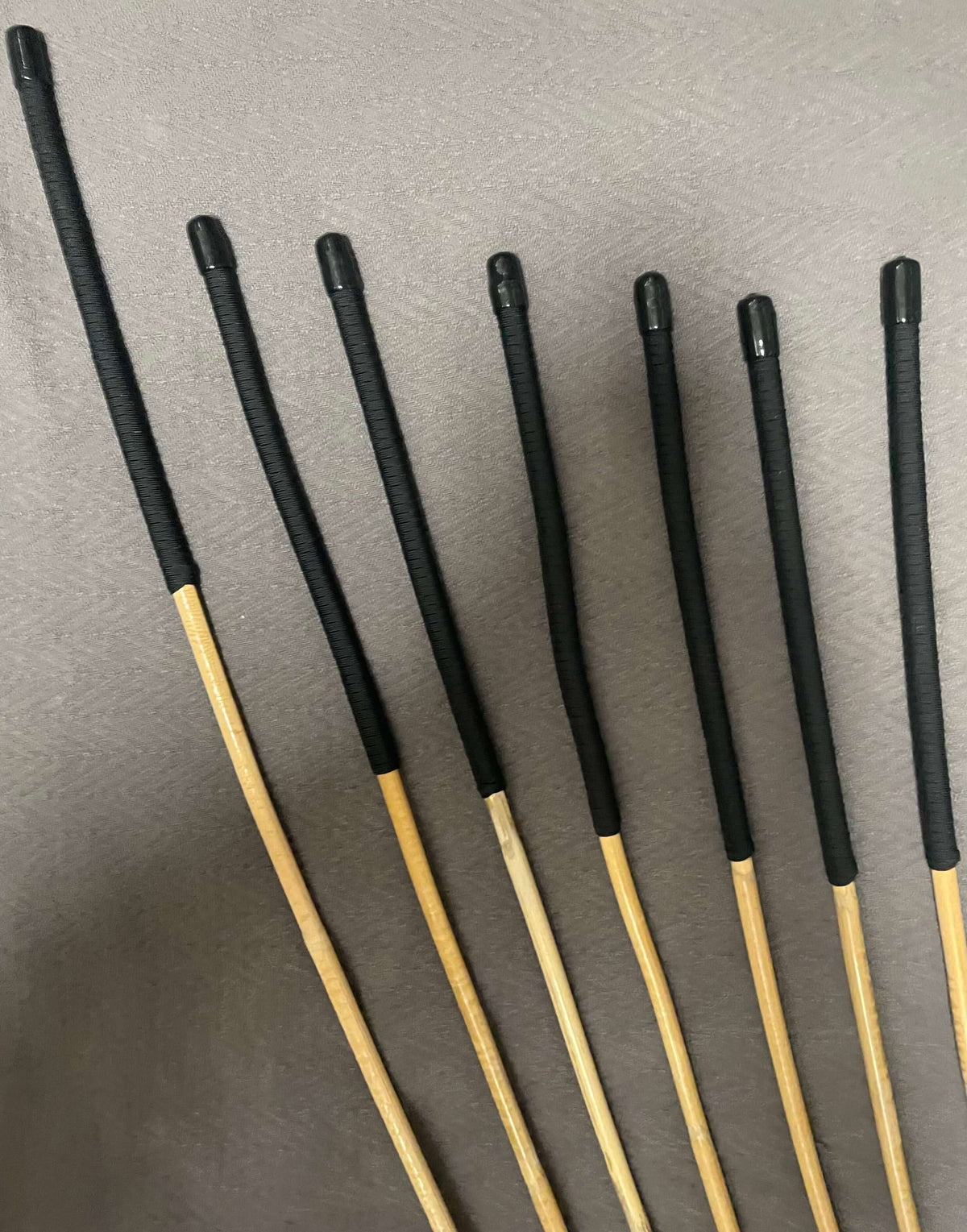 Set of 7 Kooboo Rattan Punishment canes with BLACK Paracord Handles