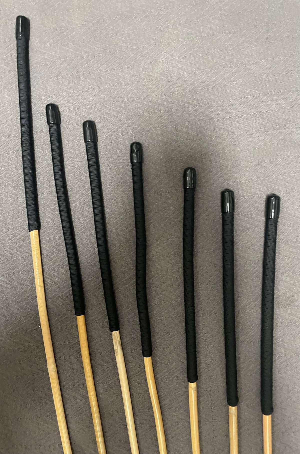 Set of 7 Kooboo Rattan Punishment canes with BLACK Paracord Handles