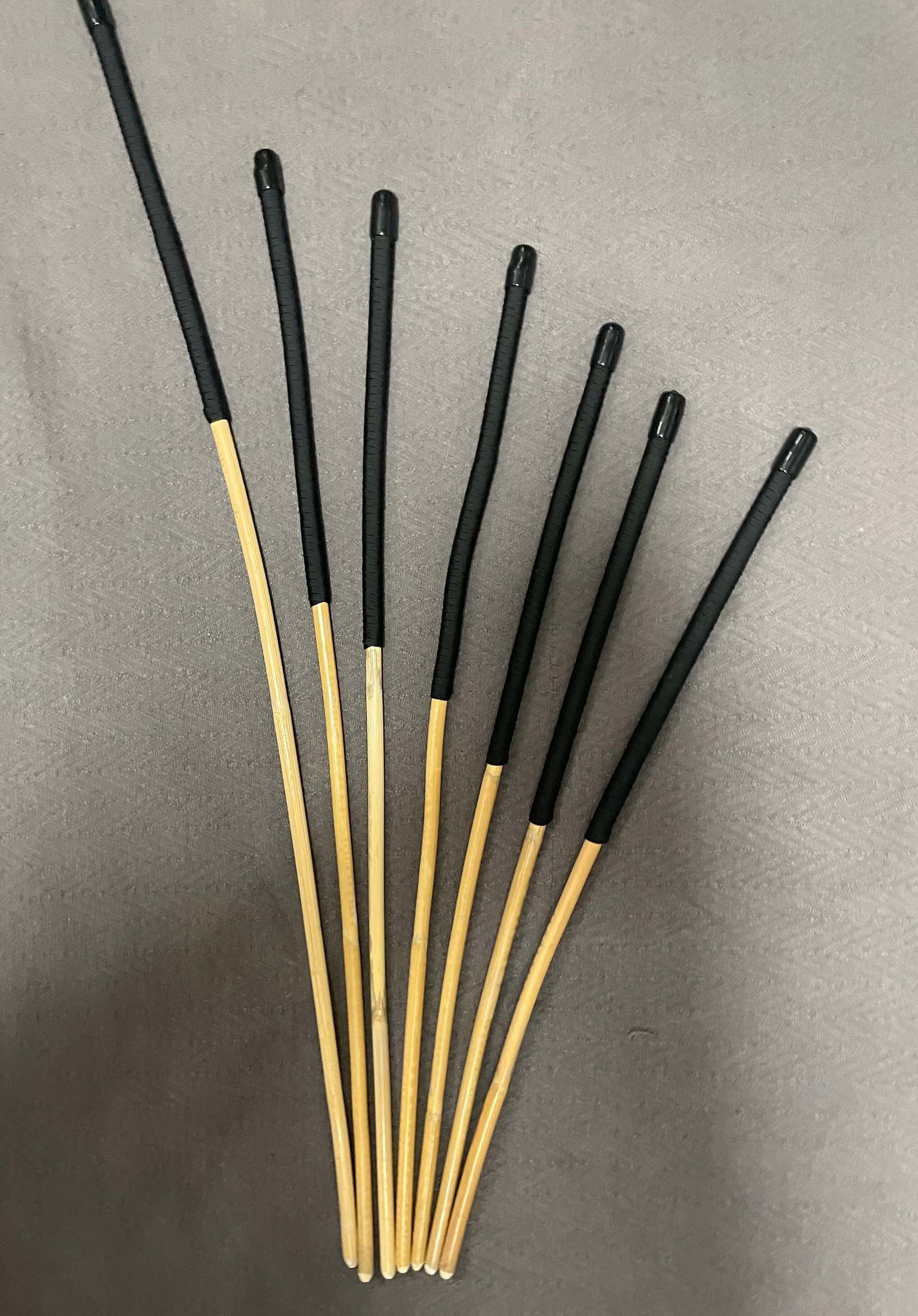 Set of 7 Kooboo Rattan Punishment canes with BLACK Paracord Handles - Englishvice Canes