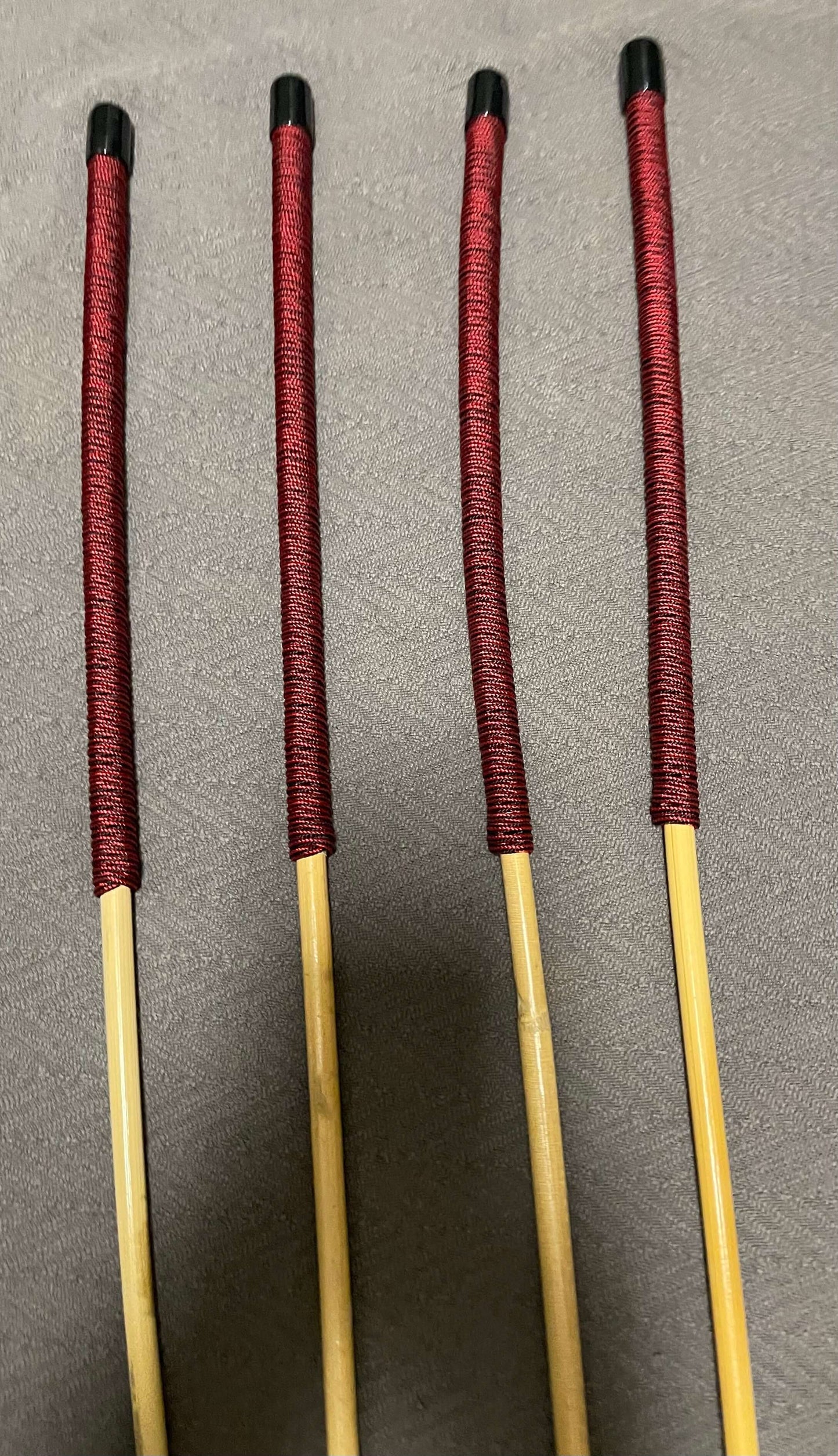 Set of 4 Classic Kooboo Rattan Punishment canes  with Liquorice Paracord Handles - 85 to 88 cms Length - 9.5 to 10.5 mm Diameters - Englishvice Canes