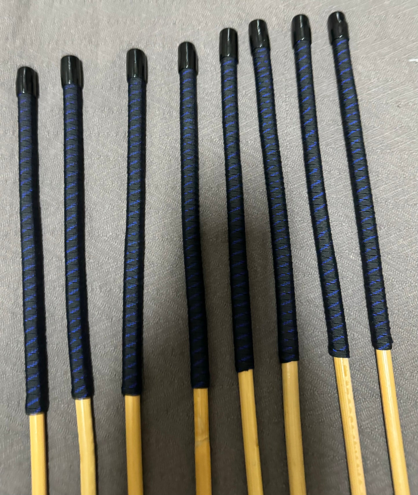 Set of 8 Kooboo Rattan OTK Punishment canes with BLUE STREAK Paracord Handles - 60 cms L & 9 - 11.5 mm D - Englishvice Canes