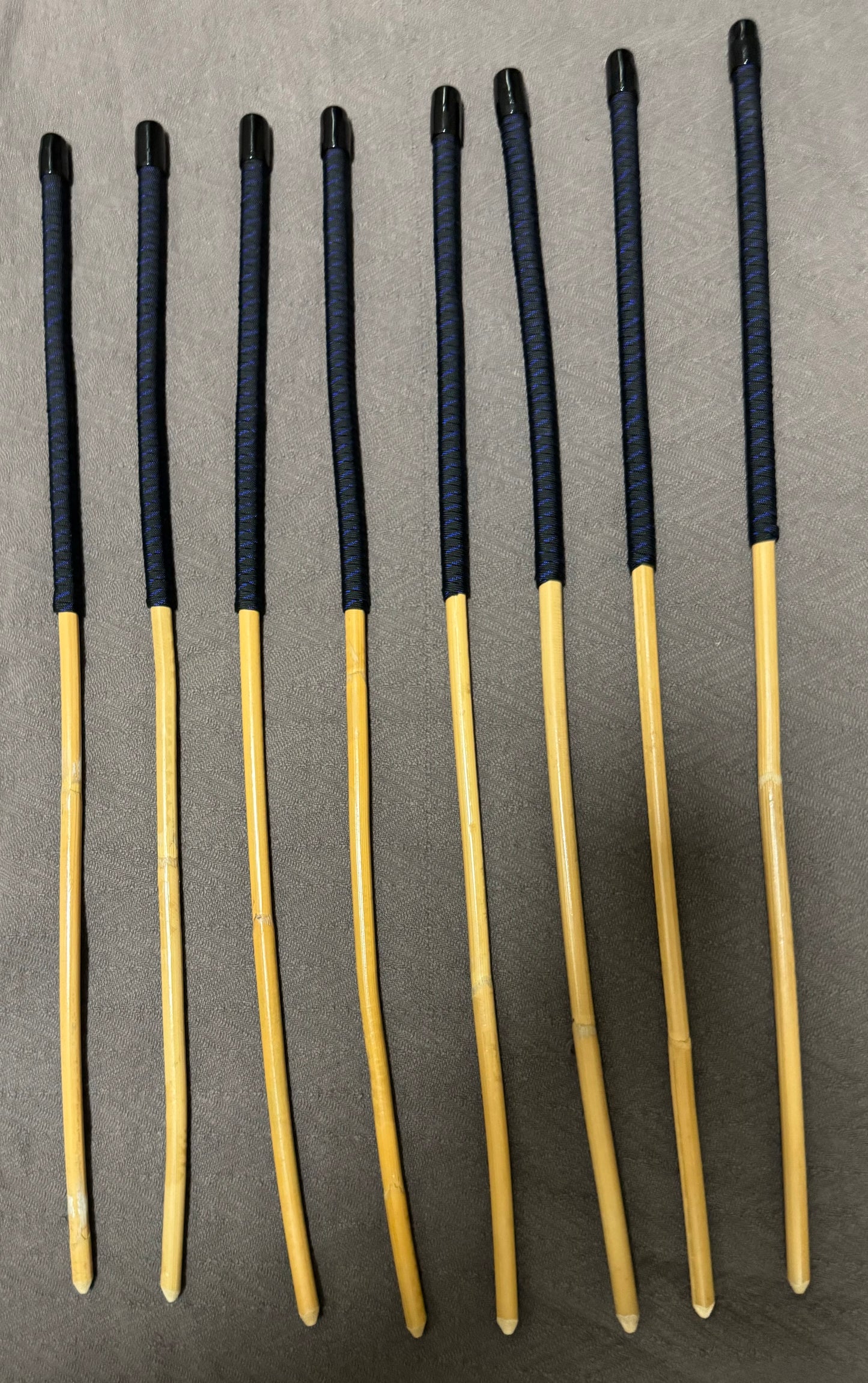 Set of 8 Kooboo Rattan OTK Punishment canes with BLUE STREAK Paracord Handles - 60 cms L & 9 - 11.5 mm D - Englishvice Canes