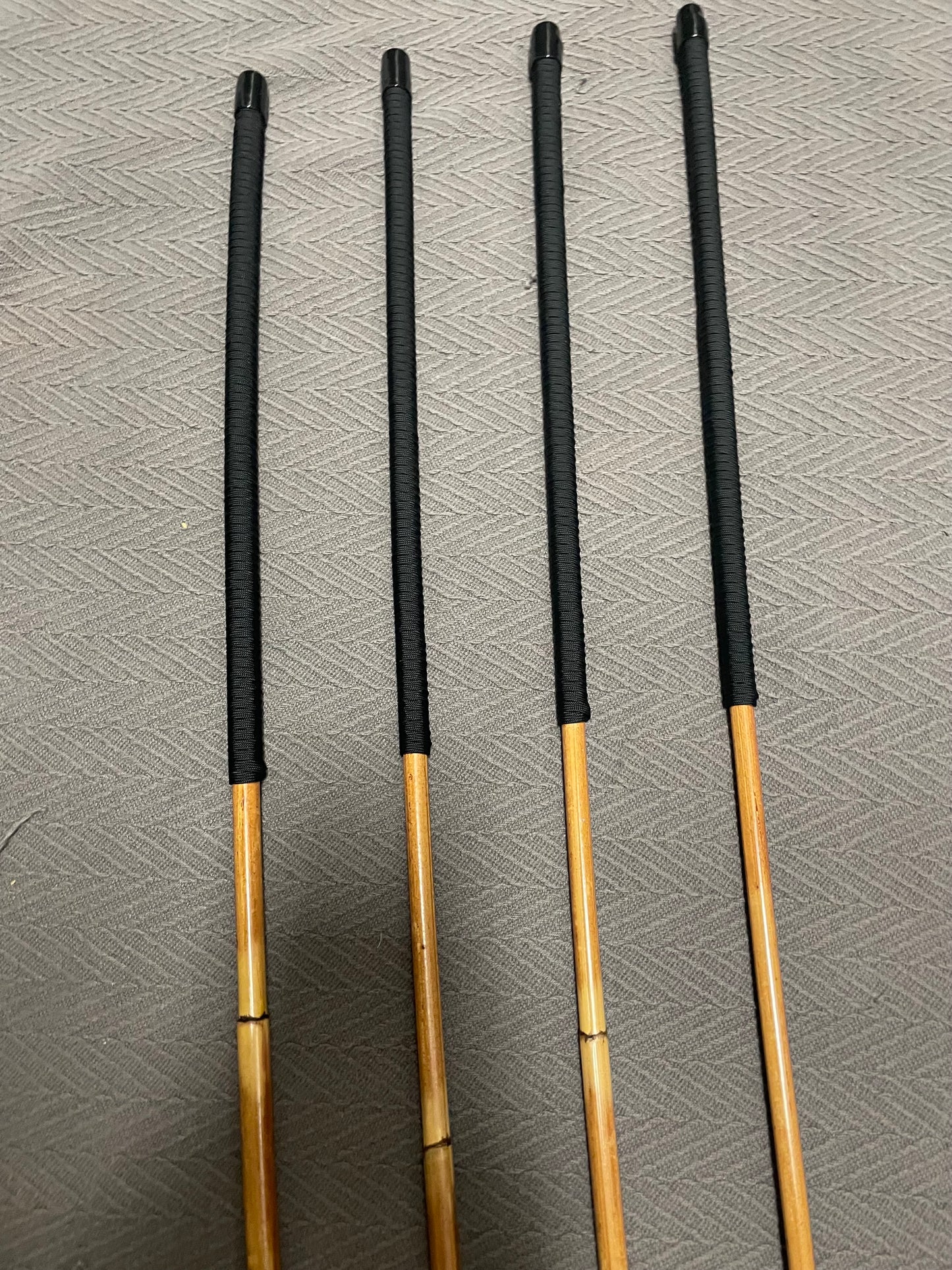 Golden / Honey Smoked Dragon Rattan Canes with Black Paracord Handles - 95 to 98 cms Length & 9 - 12.5 mm Diameters - Englishvice Canes