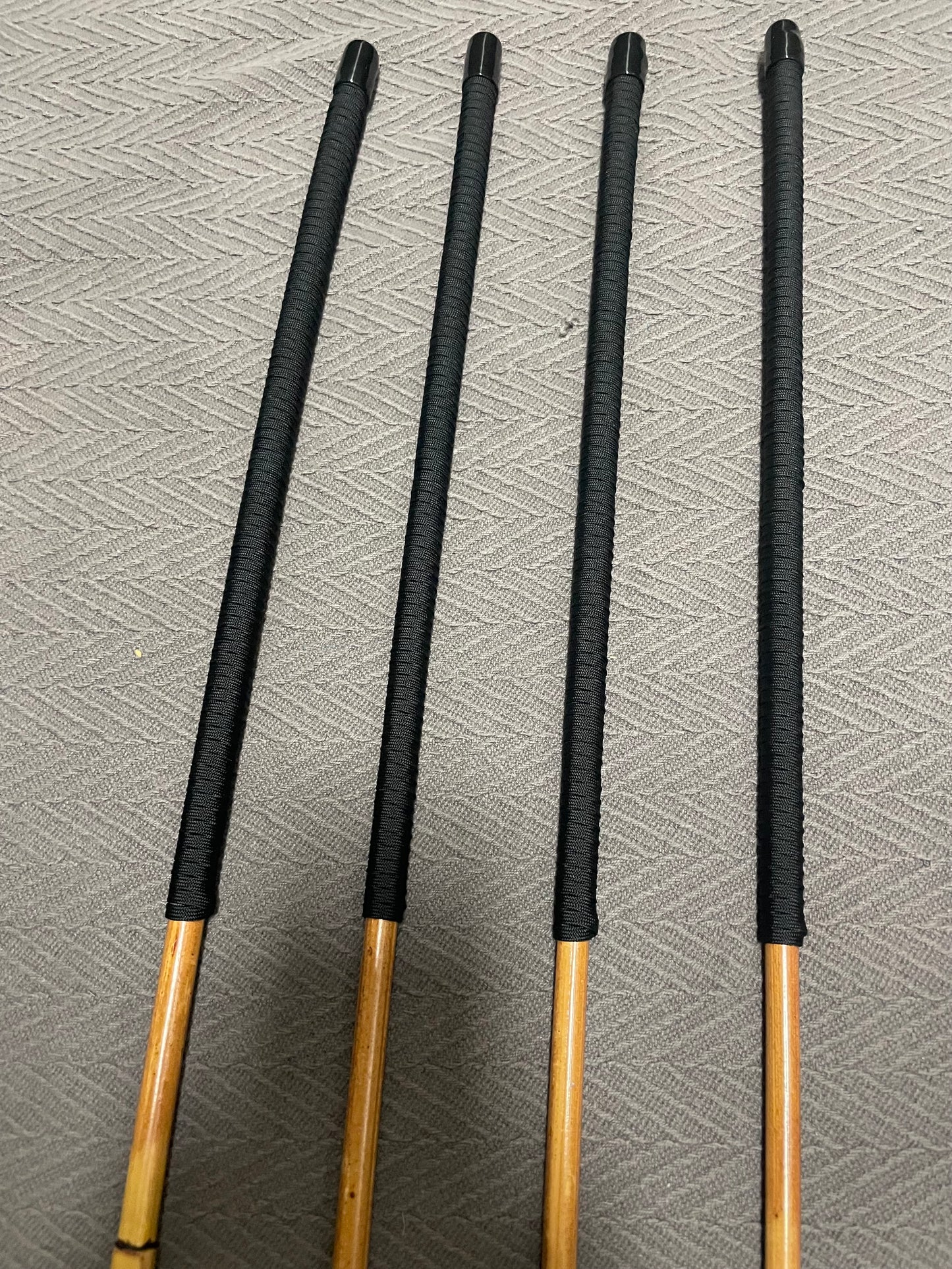 Golden / Honey Smoked Dragon Rattan Canes with Black Paracord Handles - 95 to 98 cms Length & 9 - 12.5 mm Diameters - Englishvice Canes