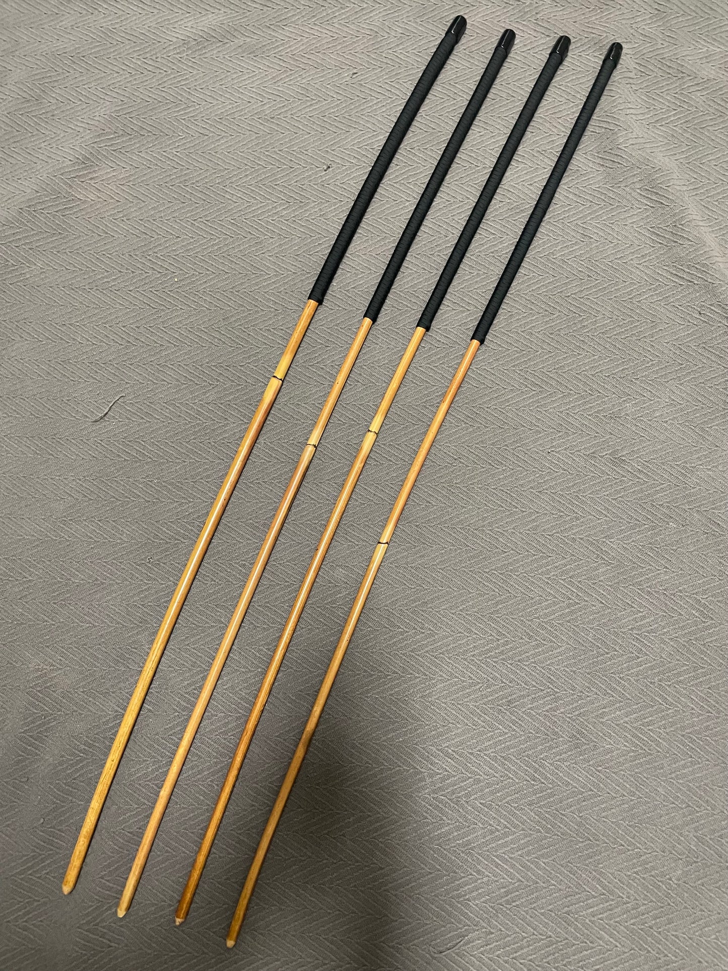 Golden / Honey Smoked Dragon Rattan Canes with Black Paracord Handles - 95 to 98 cms Length & 9 - 12.5 mm Diameters - Englishvice Canes