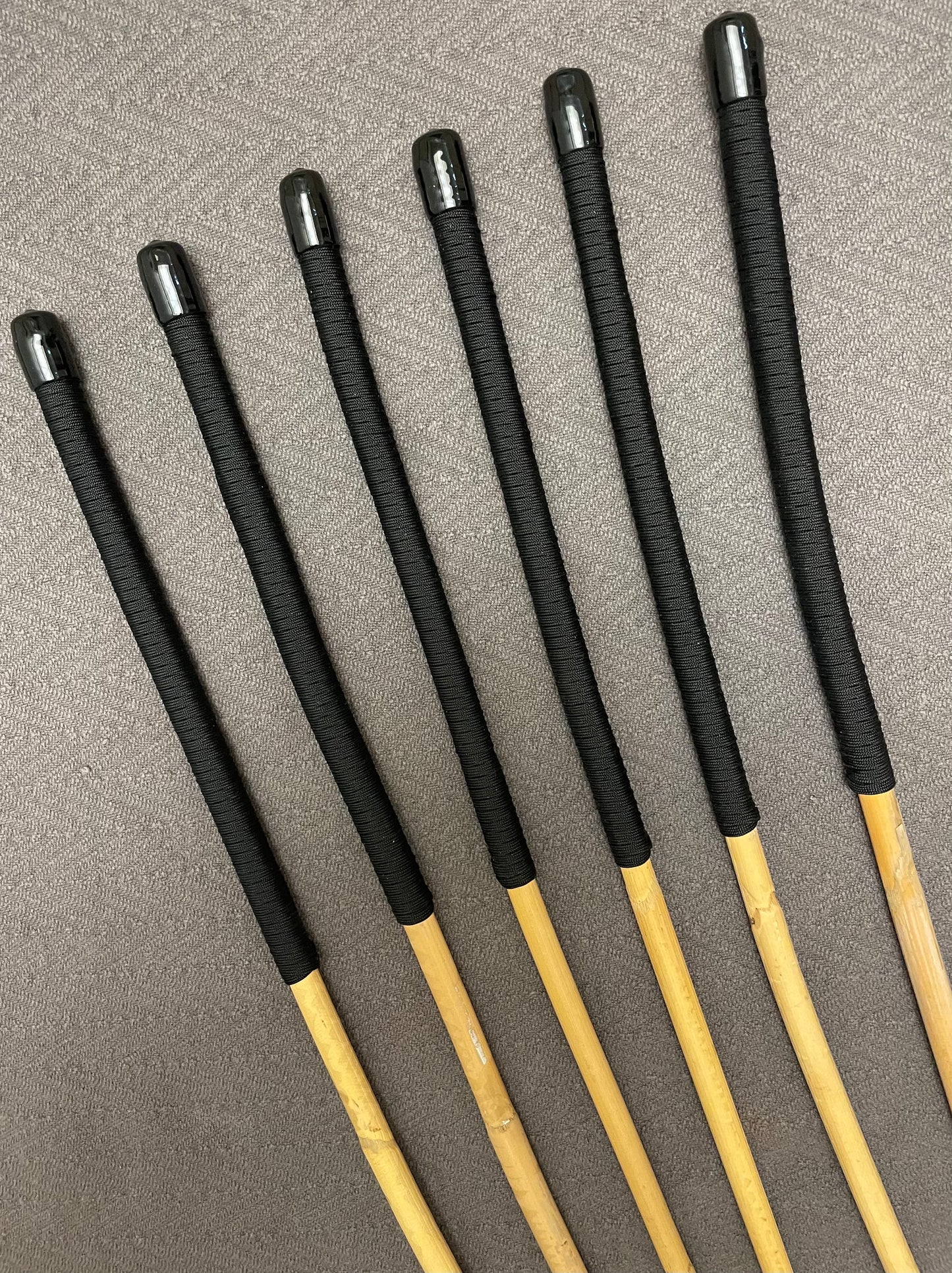 OTK Classic Kooboo Cane Six - Set of 6 Kooboo OTK Punishment canes - BLACK Handles - 60 cms L & 10-12.5 mm D ( Assorted )